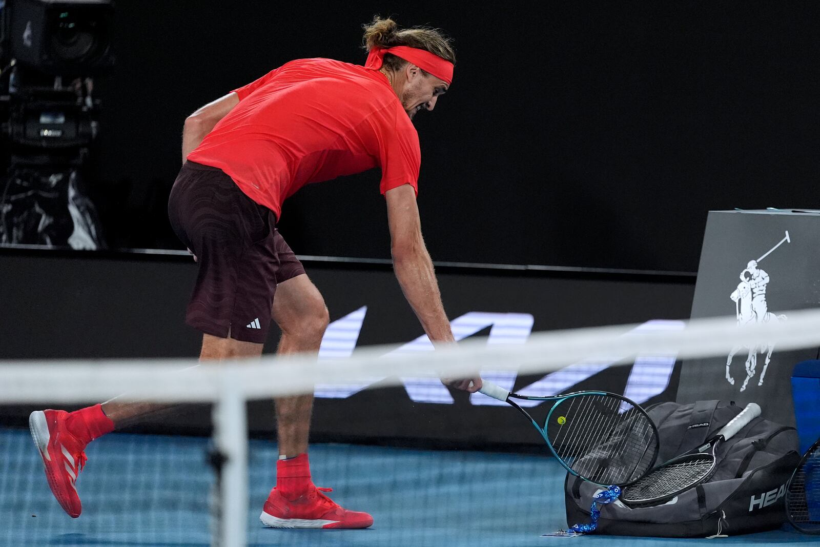 Alexander Zverev of Germany reacts after losing the second set during the men's singles final against Jannik Sinner of Italy at the Australian Open tennis championship in Melbourne, Australia, Sunday, Jan. 26, 2025. (AP Photo/Asanka Brendon Ratnayake)