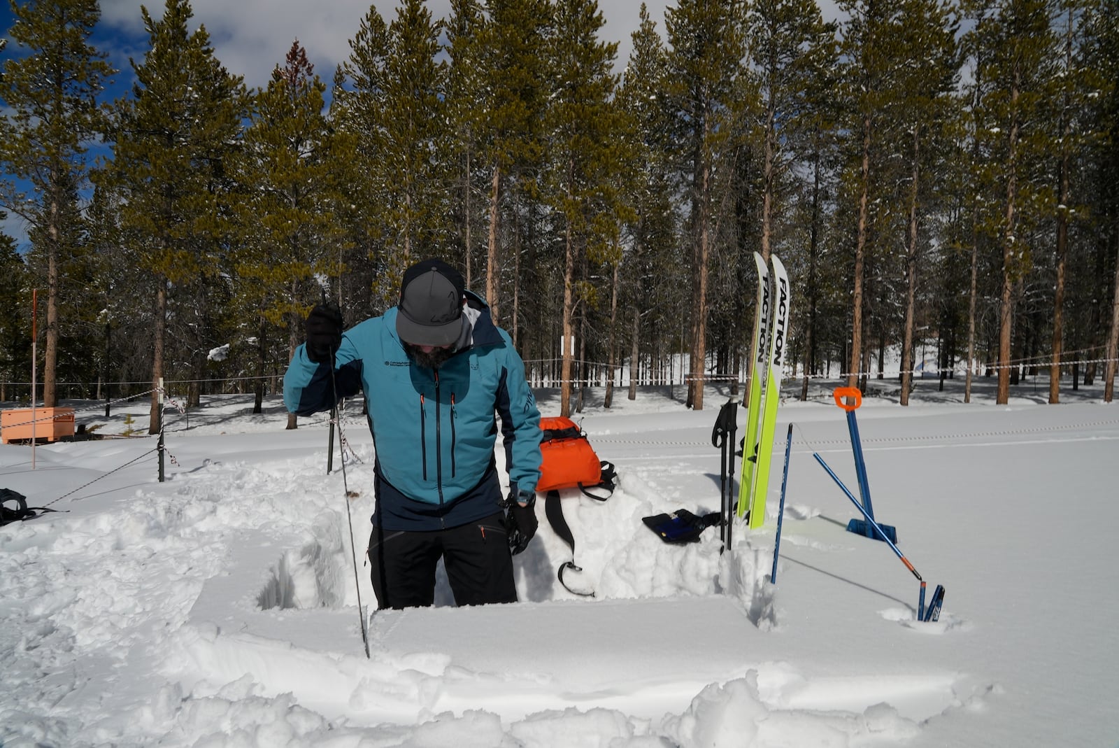 Ethan Greene, director of the Colorado Avalanche Information Center, digs a demonstration snow pit Wednesday, March 5, 2025, in Leadville, Colo. (AP Photo/Brittany Peterson)