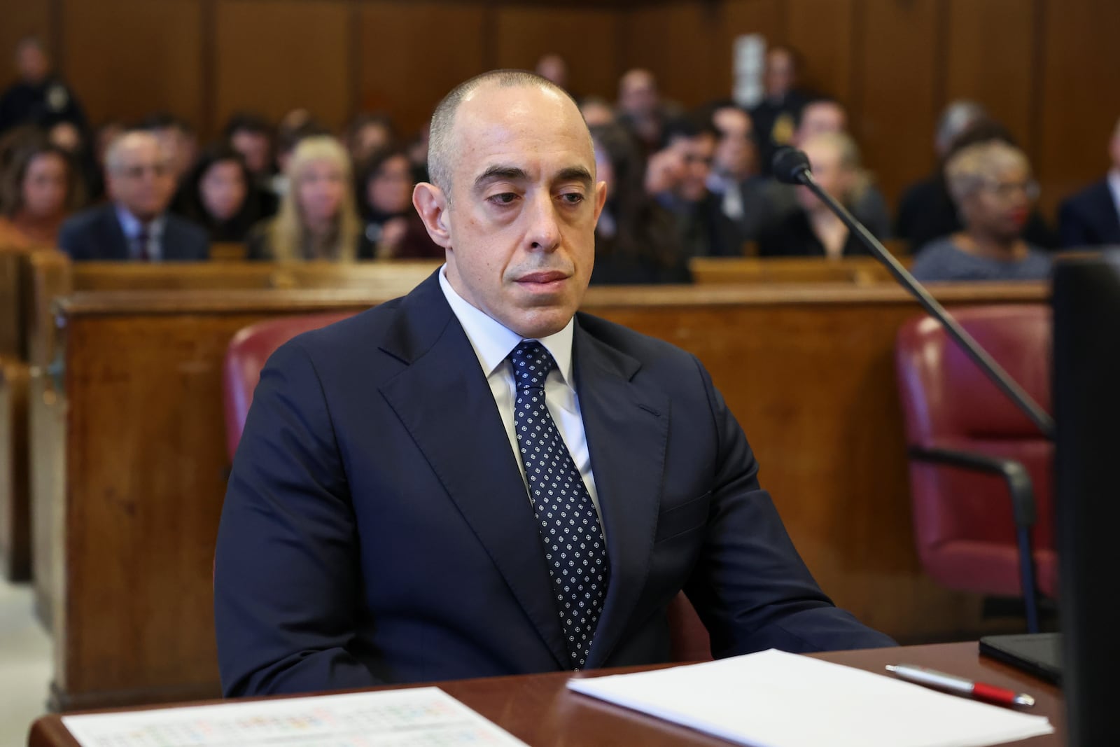 FILE - Attorney Emil Bove sits on the day of a sentencing hearing in the criminal case in which President-elect Donald Trump was convicted in 2024 on charges involving hush money paid to a porn star, outside of New York Criminal Court in Manhattan in New York City, Jan. 10, 2025. (Brendan McDermid, Pool Photo via AP, File)