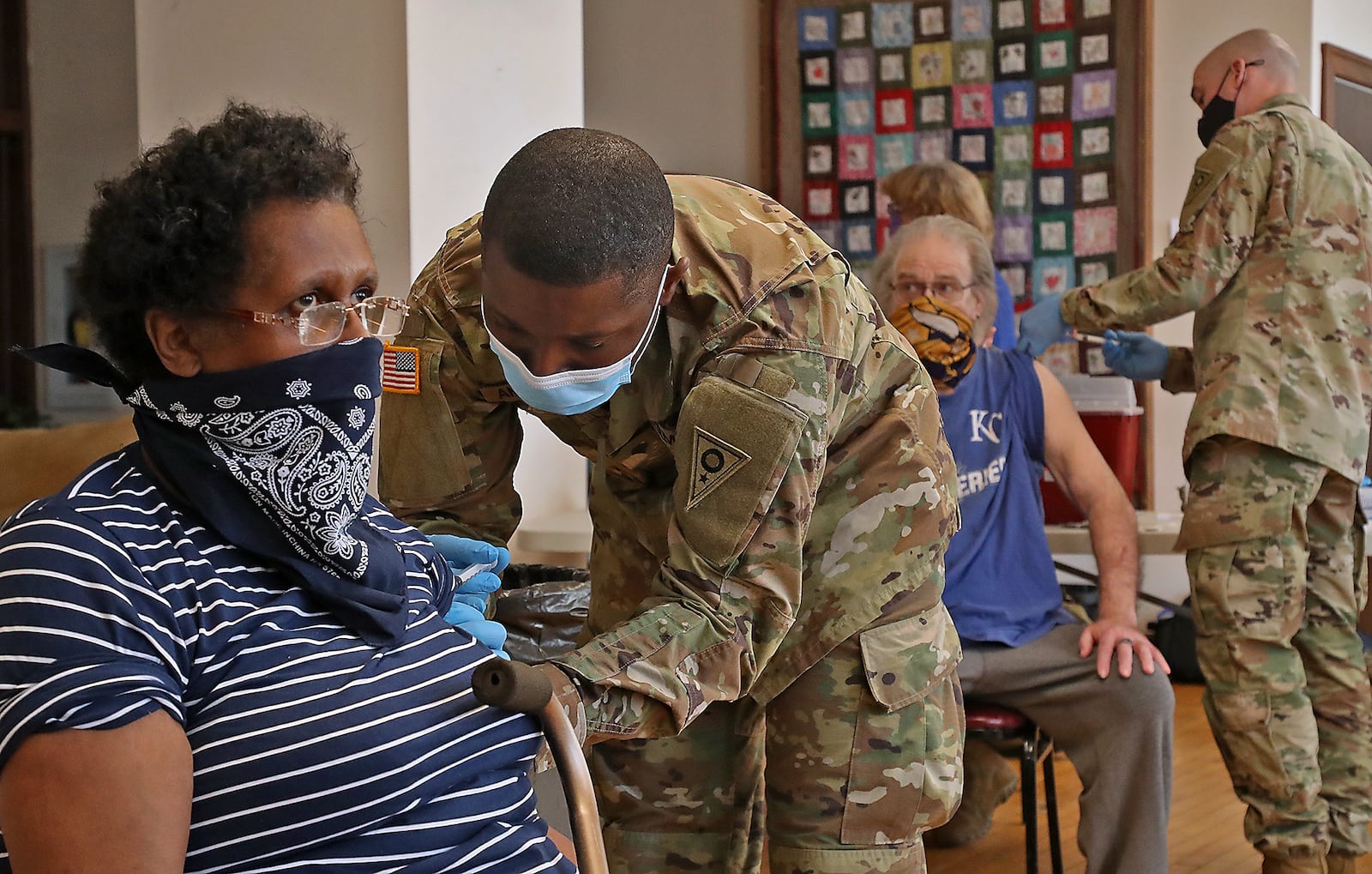 The National Guard helped bring the COVID-19 vaccine to residents at Shawnee Place senior apartments in Springfield earlier this year. County officials to increase the vaccine rate, which remains low among Black residents, they are still taking the vaccine to where people where they are. BILL LACKEY/STAFF