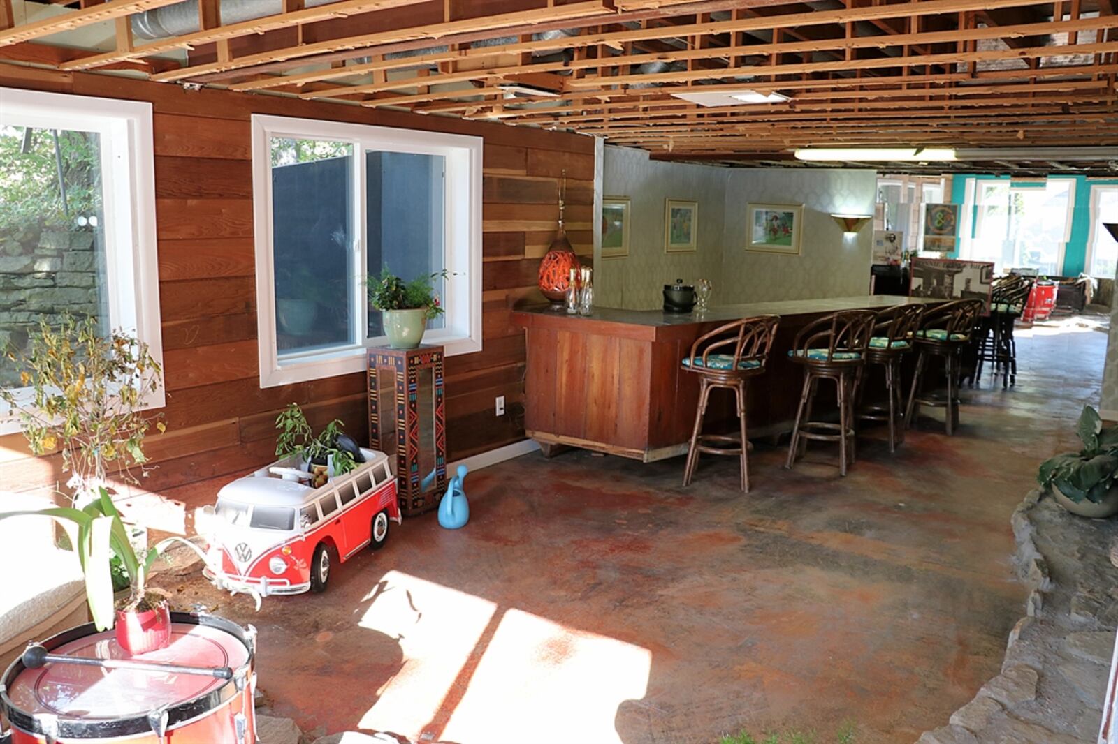 Large daylight windows fill the lower level with natural light as the space was designed into a park-like recreation and family room. 