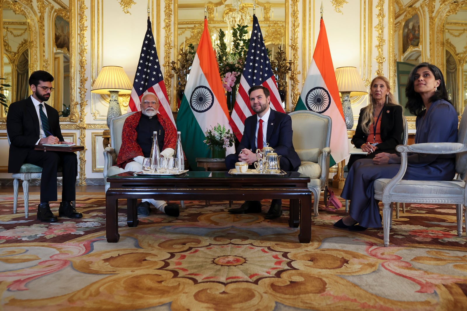 U.S. Vice President JD Vance, centre right, attends a bilateral meeting with Indian Prime Minister Narendra Modi, centre left, at the residence of the U.S. Ambassador, on the sidelines of the Artificial Intelligence Action Summit in Paris, Tuesday Feb. 11, 2025. (Leah Millis/Pool via AP)