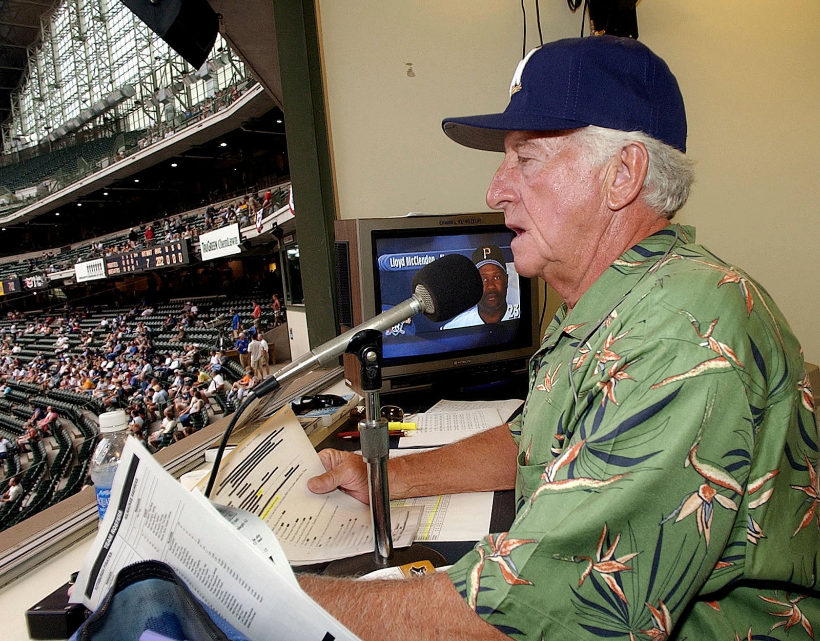 FILE 0 Milwaukee Brewers' radio announcer Bob Uecker works out of the radio booth during a baseball game against the Pittsburgh Pirates Monday, July 7, 2003, at Miller Park in Milwaukee. (AP Photo/Morry Gash, File)