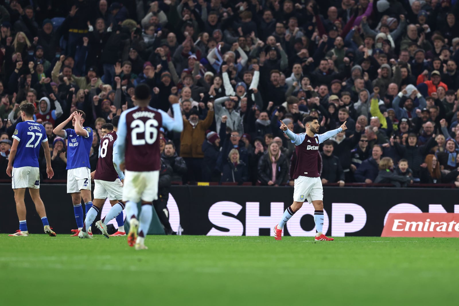 Aston Villa's Marco Asensio, right, celebrates after scoring his side's second goal during the English FA Cup fifth round soccer match between Aston Villa and Cardiff City at the Villa Park stadium in Birmingham, England, Friday, Feb. 28, 2025. (AP Photo/Darren Staples)