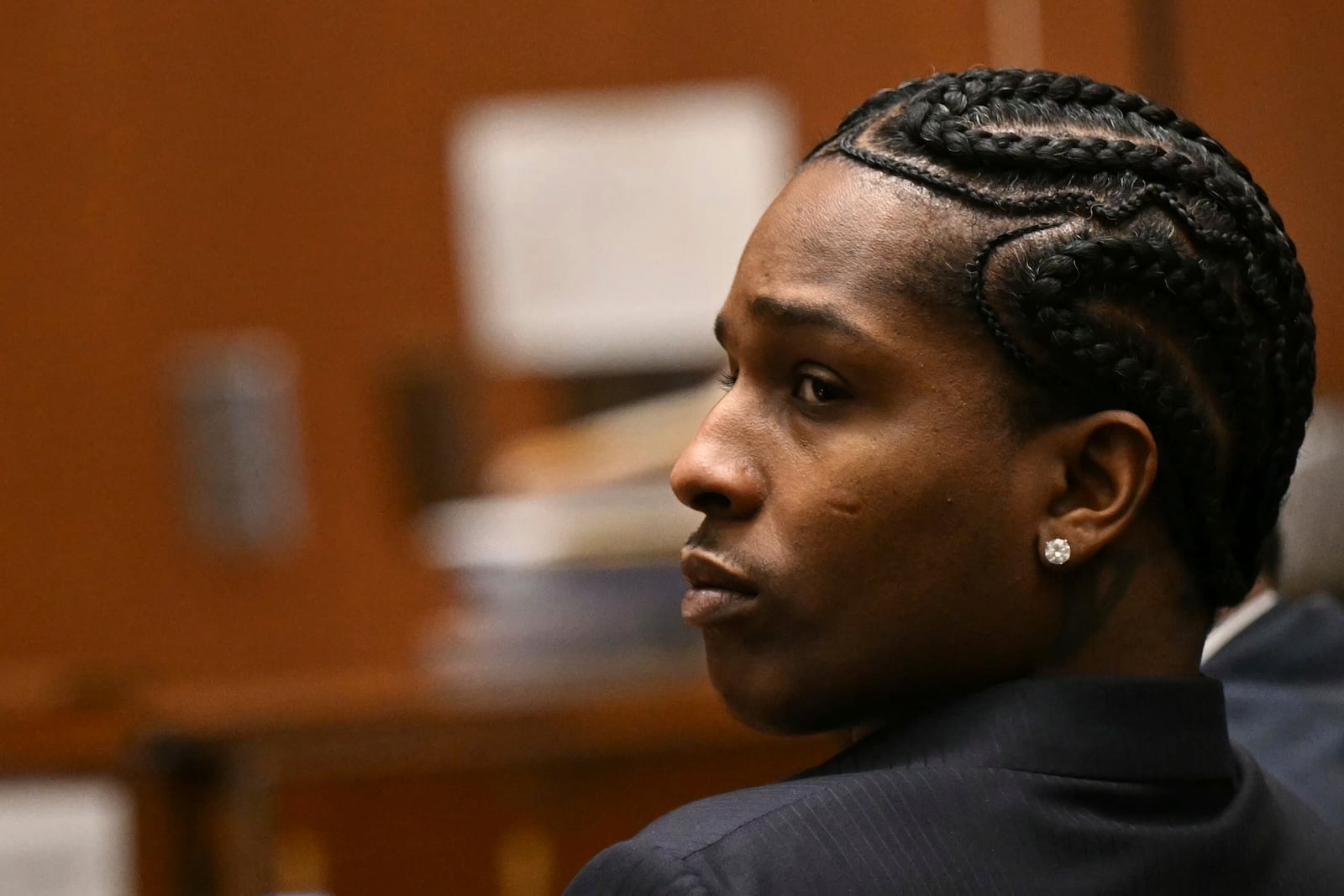 A$AP Rocky listens to closing arguments during his trial in Los Angeles, Friday, Feb. 14, 2025. (Patrick T. Fallon/Pool Photo via AP)