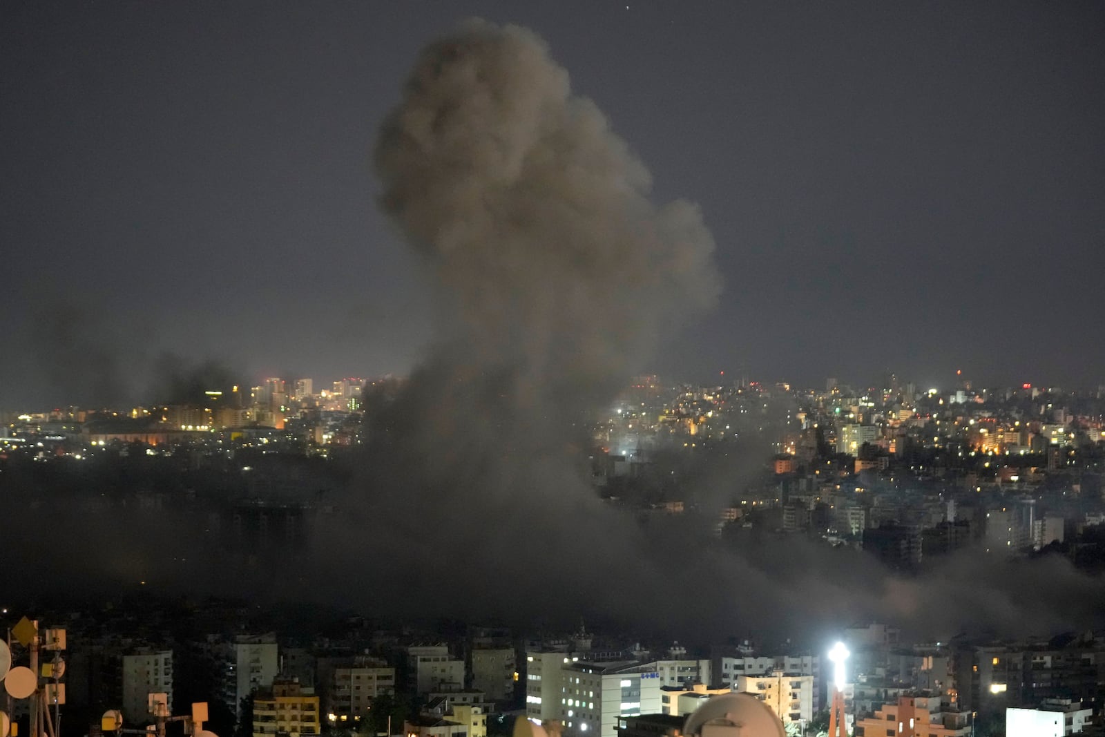 Smoke rises from an Israeli airstrike on Dahiyeh, in the southern suburb of Beirut, Lebanon, early Friday, Oct. 25, 2024. (AP Photo/Hussein Malla)