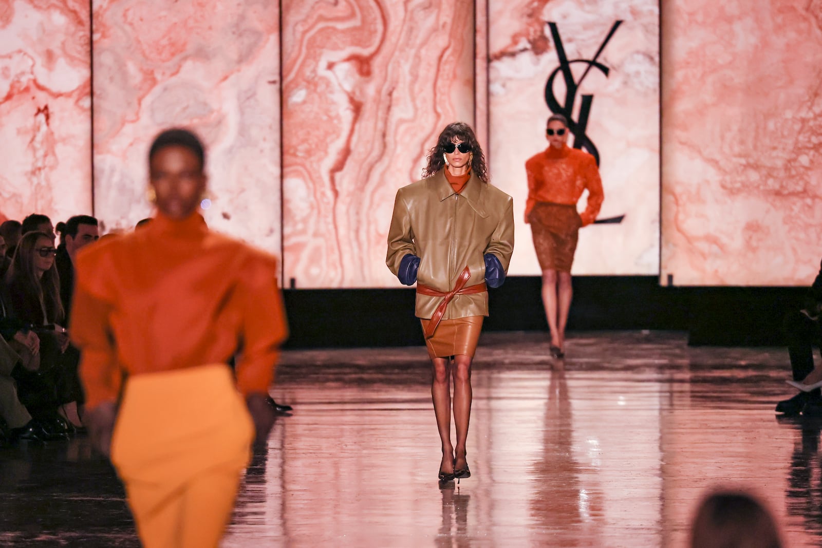 A model wears a creation as part of the Saint Laurent Fall/Winter 2025-2026 Womenswear collection presented Tuesday, March 11, 2025. in Paris. (AP Photo/Thomas Padilla)