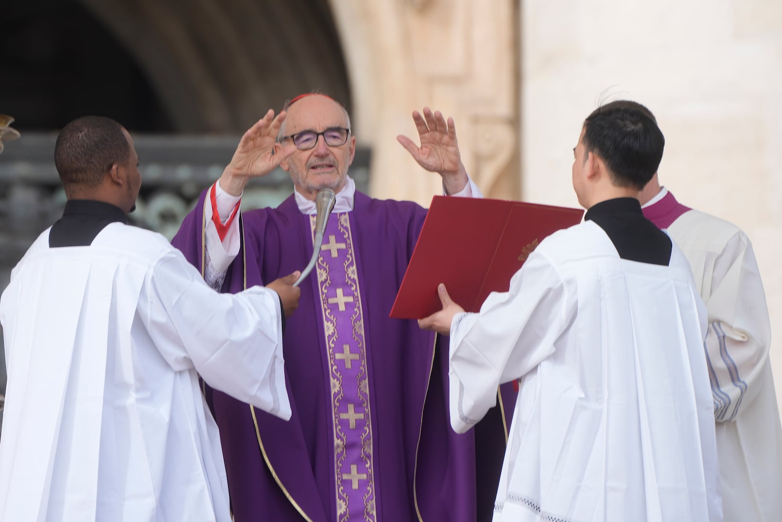 Cardinal Michael Czerny, prefect of the Dicastery for Promoting Integral Human Development, and delegate of Pope Francis celebrates a mass for the members of the world of volunteers in St. Peter's Square at The Vatican, Sunday, March 9, 2025. (AP Photo/Gregorio Borgia)