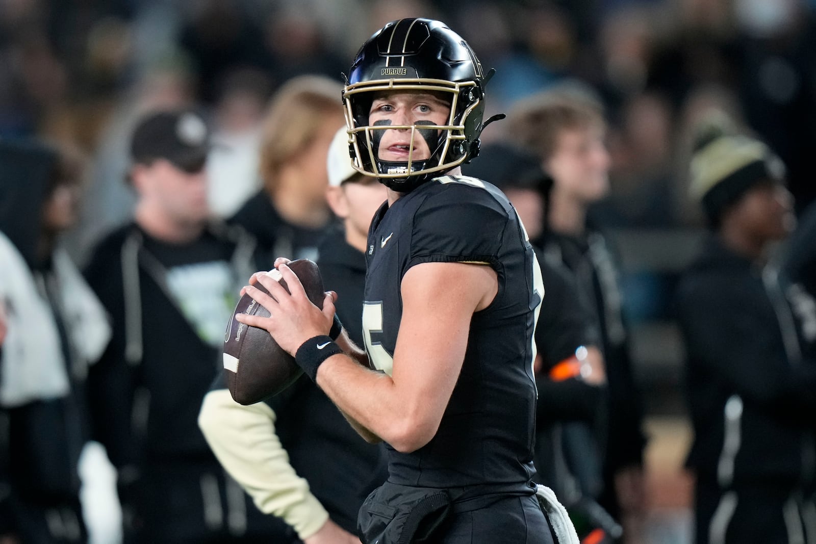 Purdue quarterback Ryan Browne throws during warmups before playing Oregon in an NCAA college football game in West Lafayette, Ind., Friday, Oct. 18, 2024. (AP Photo/AJ Mast)