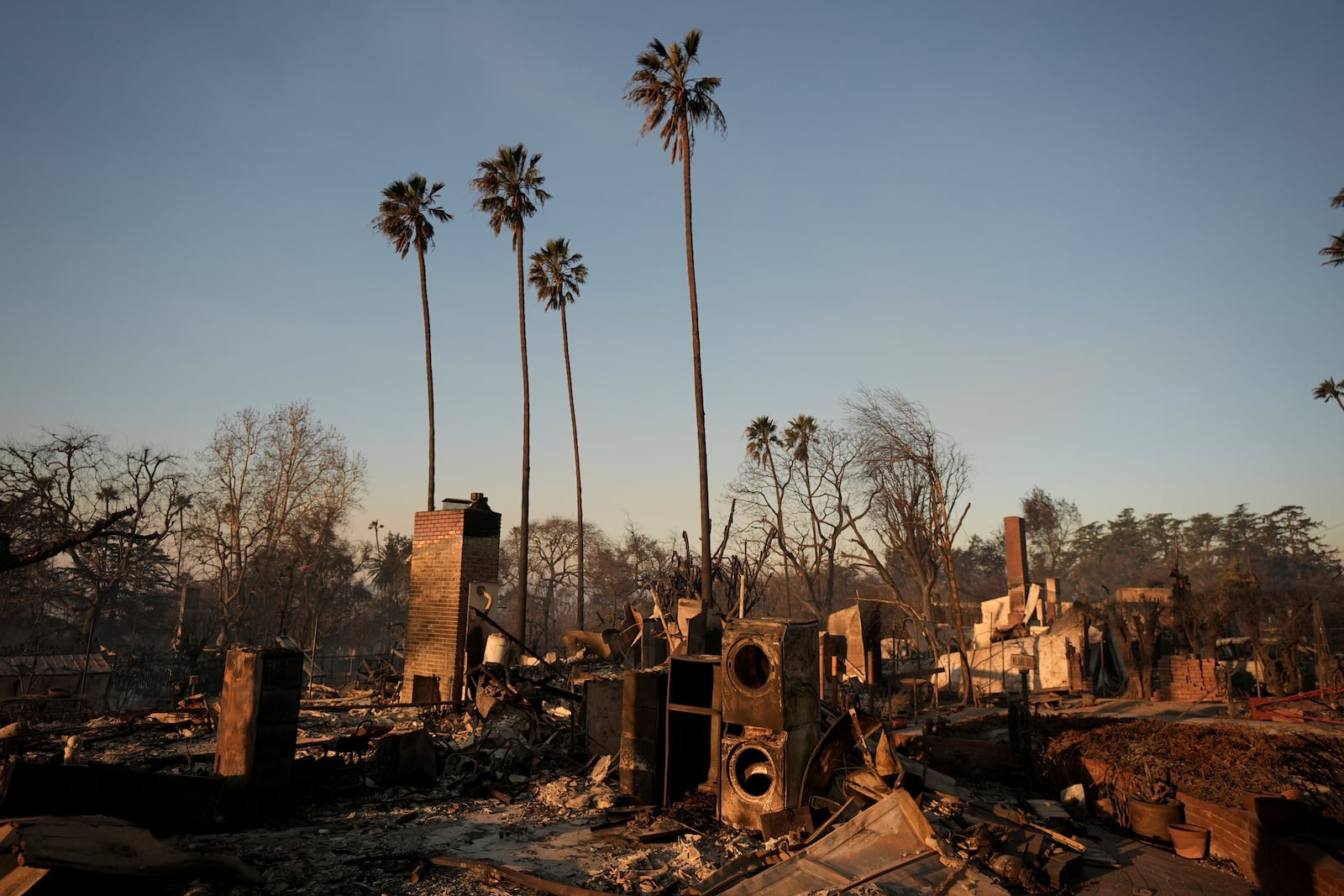 The devastation of the Eaton Fire is shown in a neighborhood Friday, Jan. 10, 2025 in Altadena, Calif. (AP Photo/Jae C. Hong)