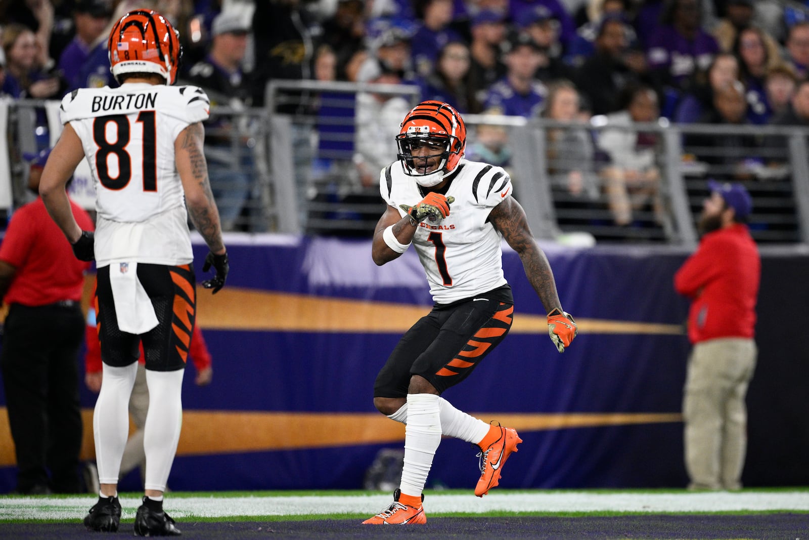 Cincinnati Bengals wide receiver Ja'Marr Chase (1) celebrates scoring a touchdown with Cincinnati Bengals wide receiver Jermaine Burton (81) during the second half of an NFL football game against the Baltimore Ravens, Thursday, Nov. 7, 2024, in Baltimore. (AP Photo/Nick Wass)