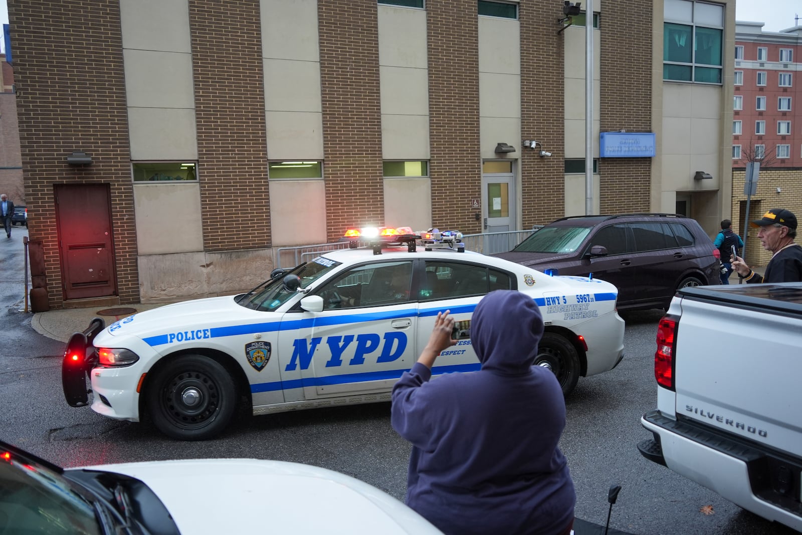 New York Police officers arrive at Altoona Police Department, where a man with a gun thought to be similar to the one used in the killing of UnitedHealthcare CEO Brian Thompson has been taken into police custody for questioning, Monday, Dec. 9, 2024, in Altoona, Pa. (AP Photo/Gene J. Puskar)