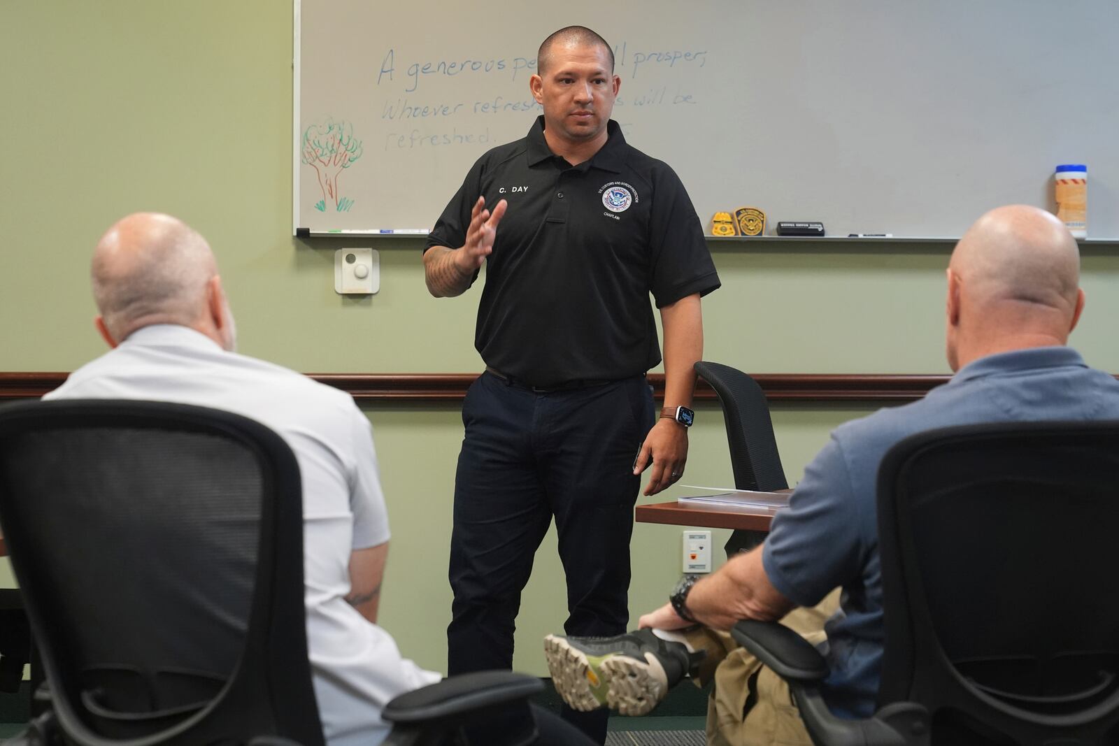 Border Patrol instructor and Chaplain Christopher Day directs a session at the Border Patrol Chaplain Academy, Wednesday, Nov. 20, 2024, in Dania Beach, Fla. (AP Photo/Marta Lavandier)