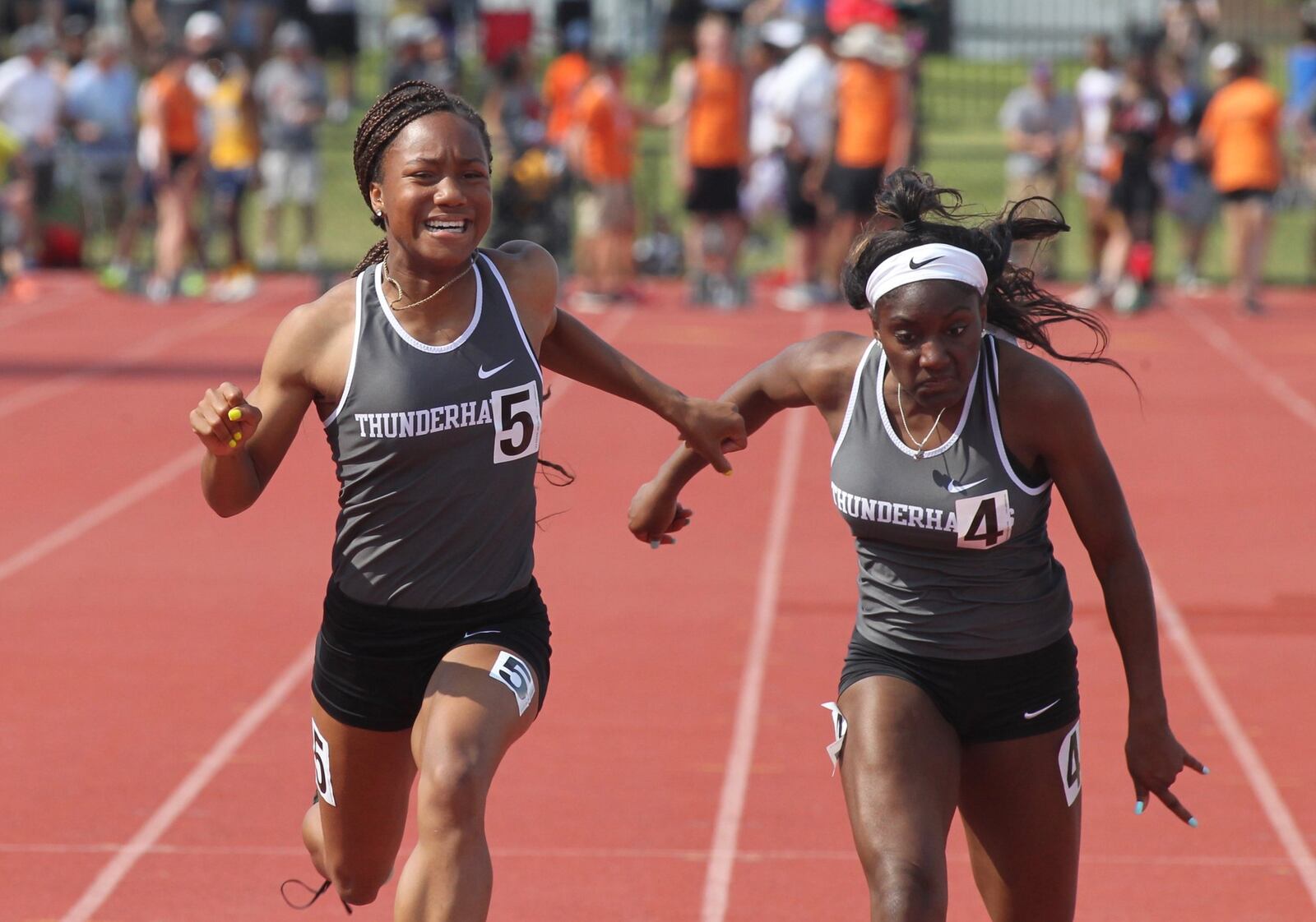 Lakota East’s Kaylyn Heath, left, and Serena Clark finish one-two in the 100-meter dash on Saturday, June 1, 2019, at the Division I state track and field championships at Jesse Owens Memorial Stadium in Columbus. David Jablonski/Staff