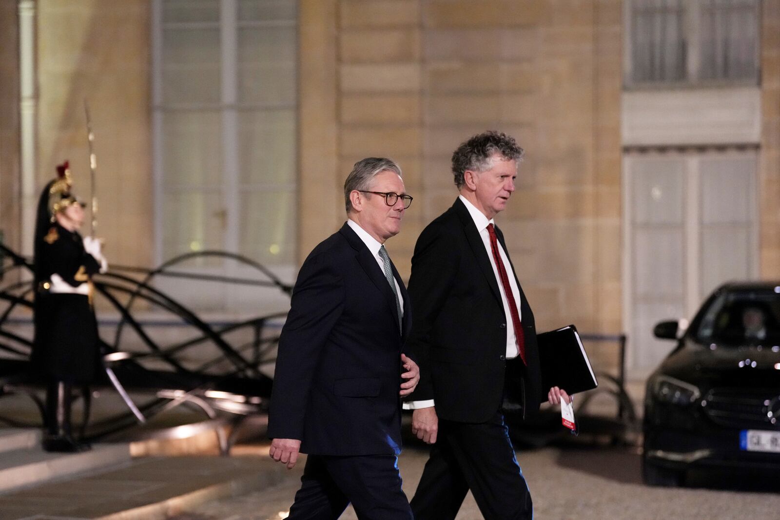 Britain's Prime Minister Keir Starmer, center left, leaves the Elysee Palace, after an informal meeting of leaders from key European Union nations and the United Kingdom, in Paris, Monday, Feb. 17, 2025. (AP Photo/Aurelien Morissard)