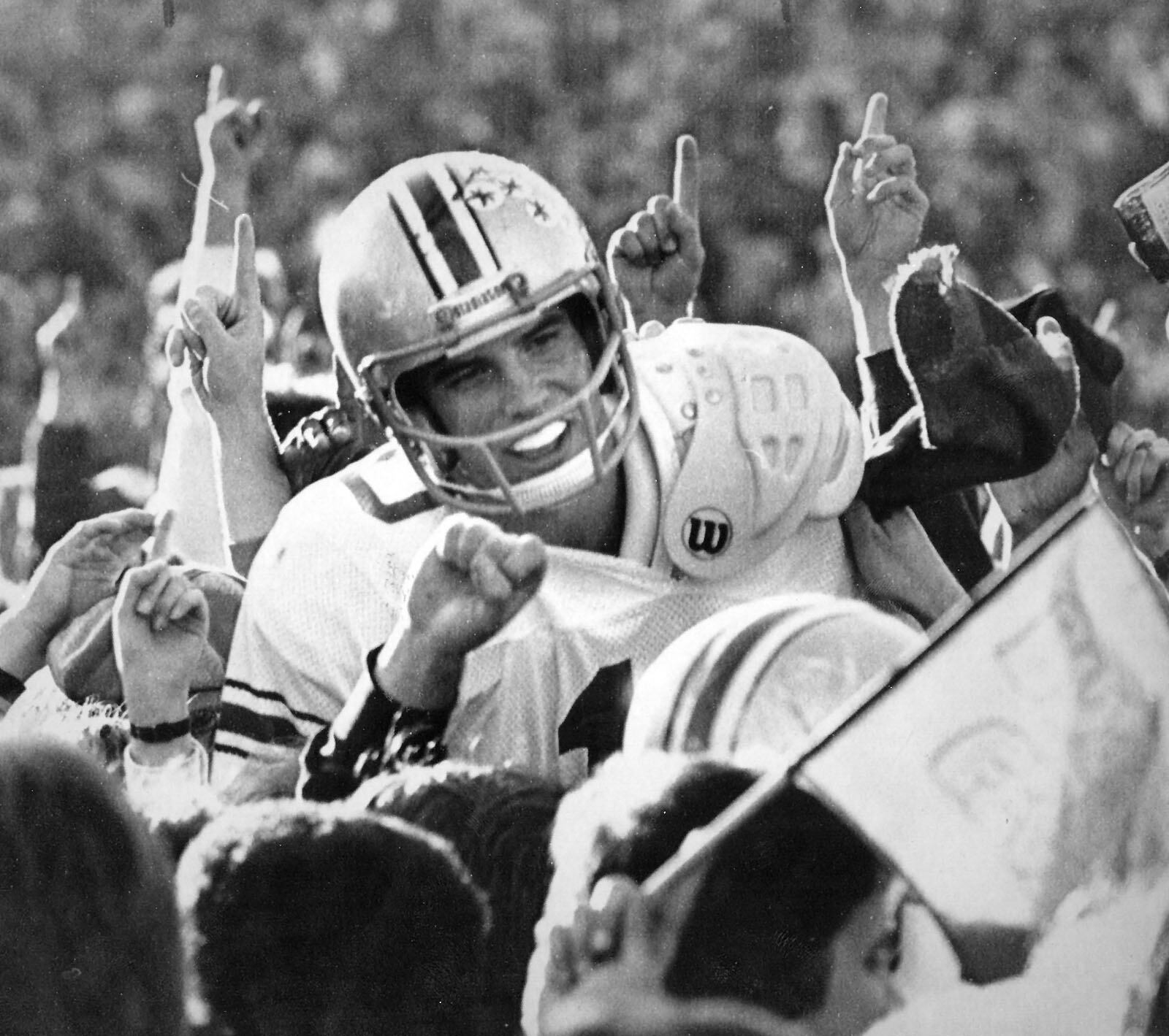 Art Schlichter, shown during his glory days after his Ohio State team beat Michigan at Ann Arbor in 1979.