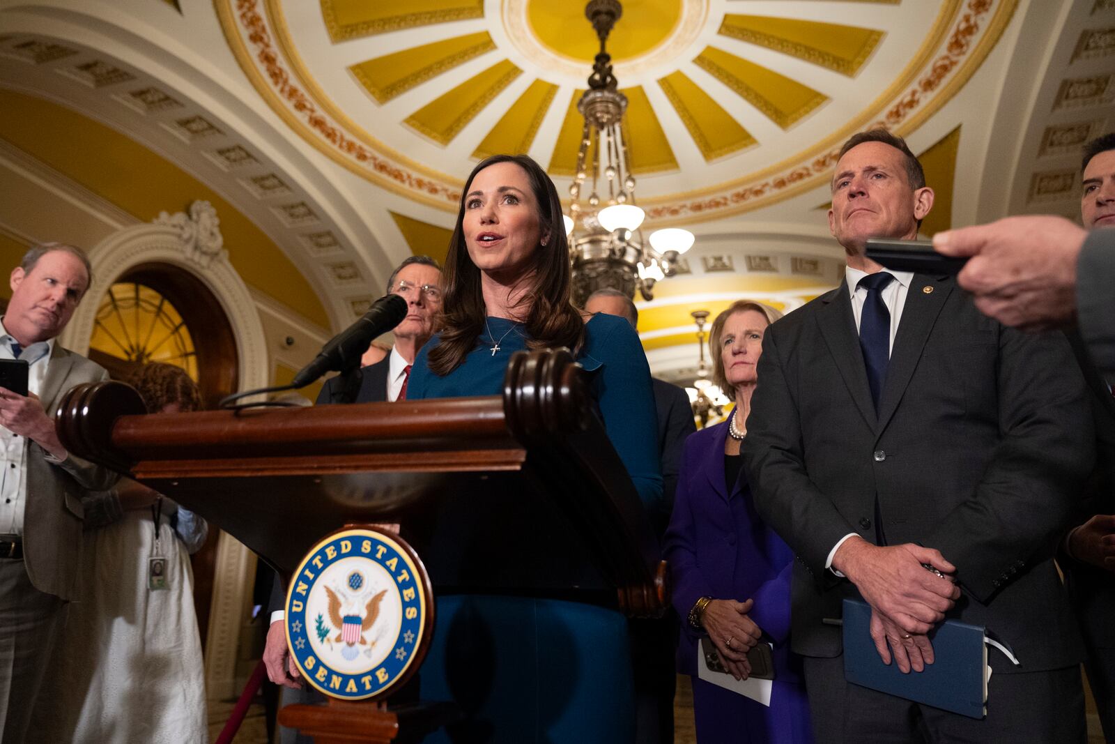 Sen. Katie Britt, R-Ala., speaks to reporters on Capitol Hill, Tuesday, Jan. 14, 2025, in Washington. (AP Photo/Mark Schiefelbein)