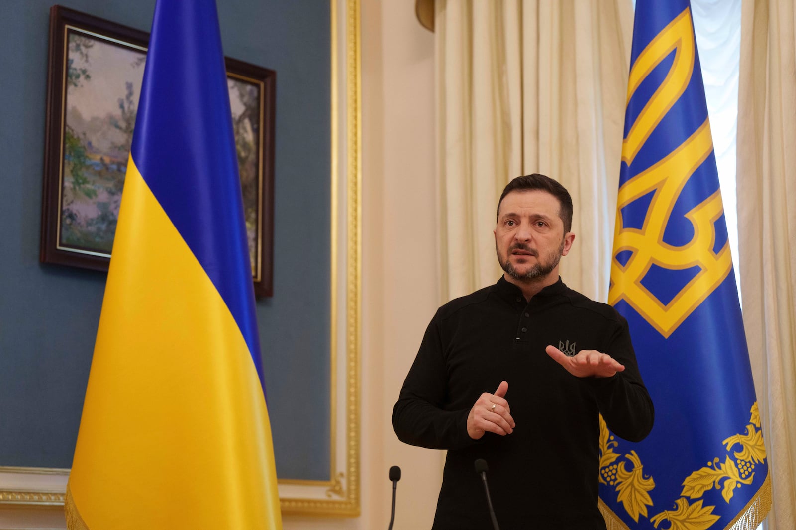 Ukrainian President Volodymyr Zelenskyy speaks to journalists during press conference in Kyiv, Ukraine, Wednesday, Feb. 26, 2025. (AP Photo/Evgeniy Maloletka)