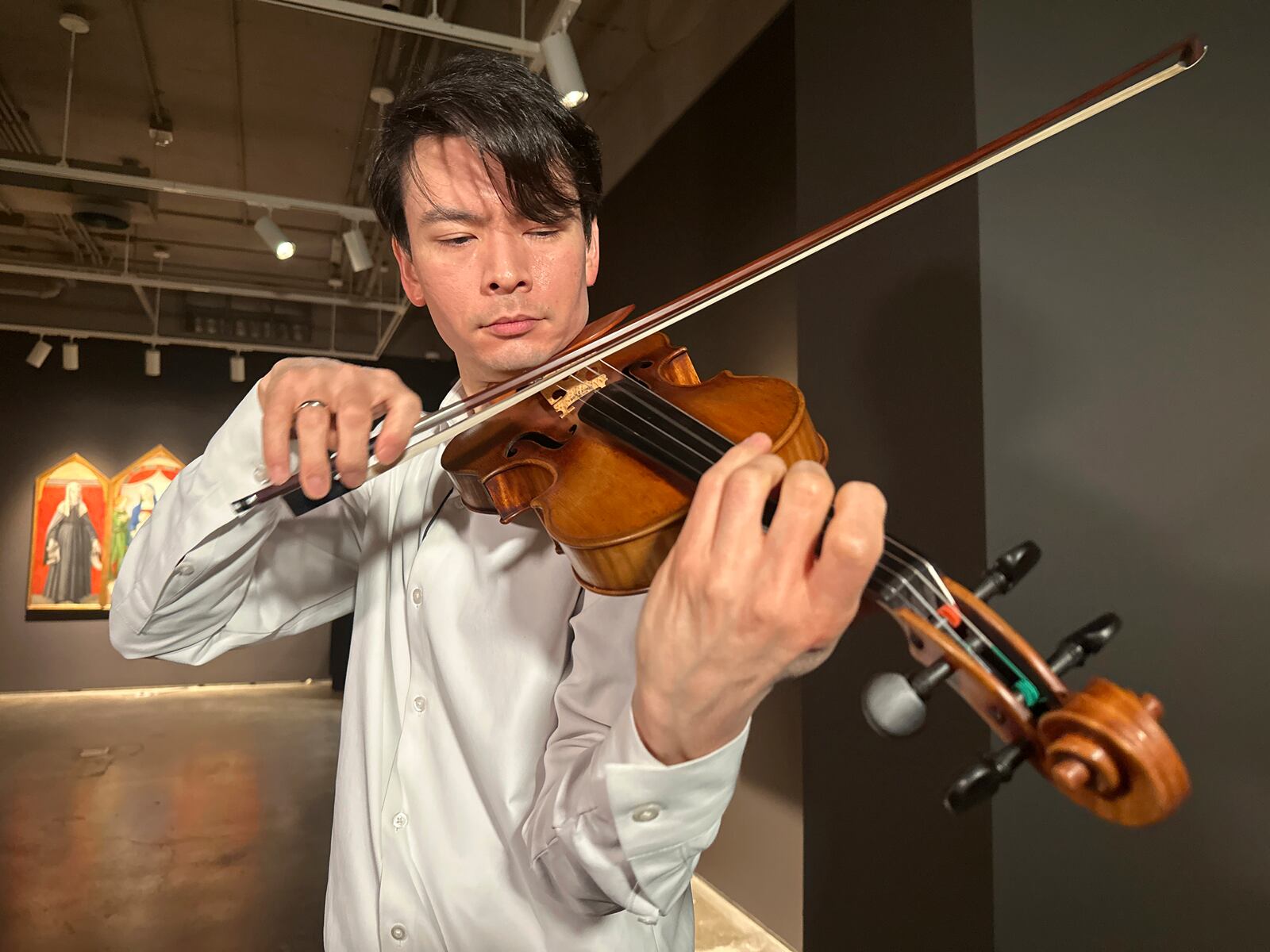 Violinist Stefan Jackiw plays the 1714 Joachim-Ma Stradivarius at Sotheby's auction house in New York on Monday, Feb. 3, 2025. (AP Photo/Ted Shaffrey)