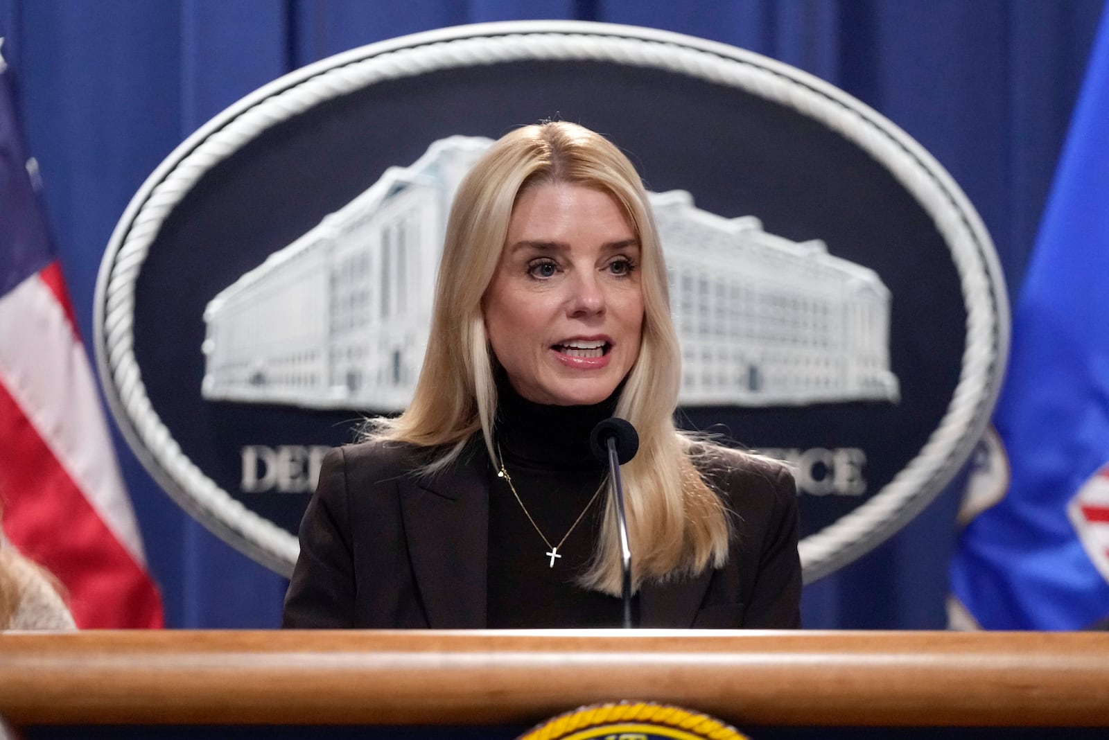 Attorney General Pam Bondi speaks at a news conference regarding immigration enforcement at the Justice Department, Wednesday, Feb. 12, 2025, in Washington. (AP Photo/Ben Curtis)