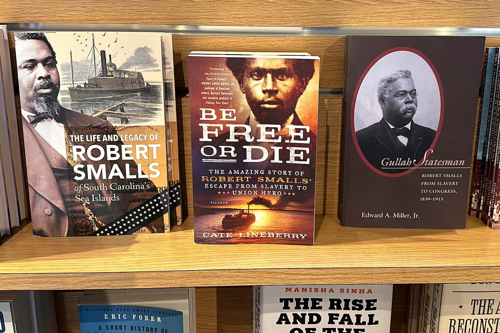 Books about Robert Smalls, who will soon be the first African American individual with a statue at the South Carolina Statehouse, are displayed at Reconstruction Era National Historic Park, Thursday, Sept. 12, 2024, in Beaufort, S.C. (AP Photo/Jeffrey Collins)