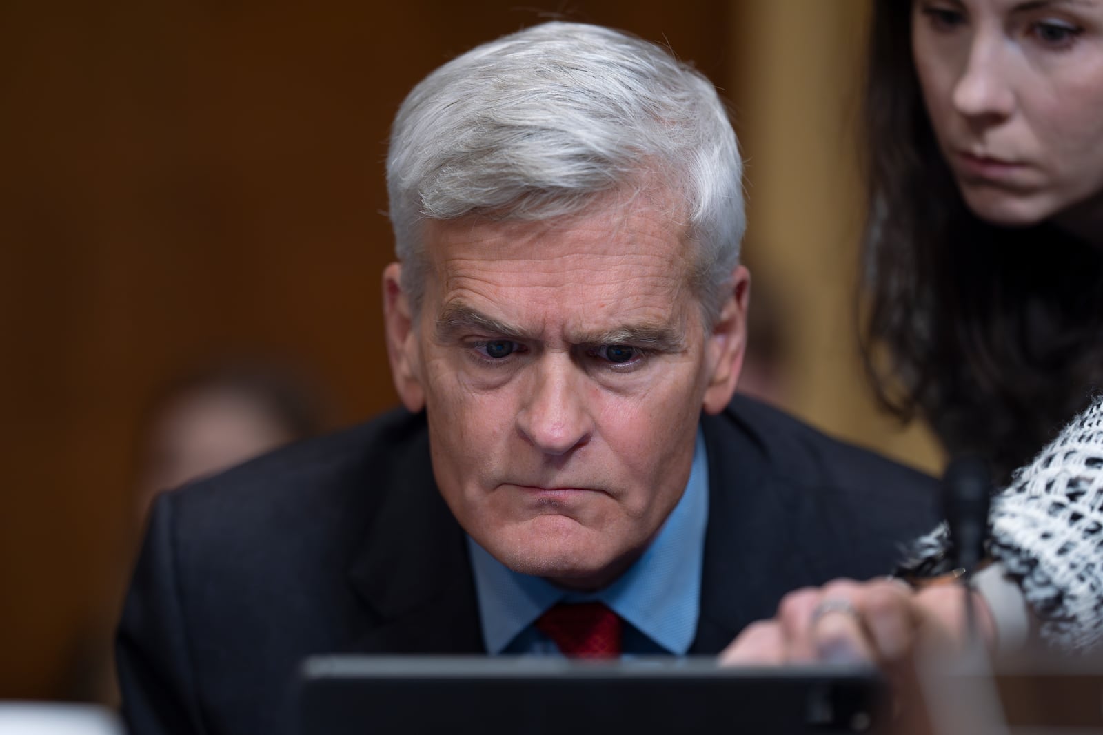 Sen. Bill Cassidy, R-La., keeps his decision until the final moment as the Senate Finance Committee holds a roll call vote to approve the nomination of Robert F. Kennedy Jr. to lead the Health and Human Services Department, at the Capitol in Washington, Tuesday, Feb. 4, 2025. (AP Photo/J. Scott Applewhite)