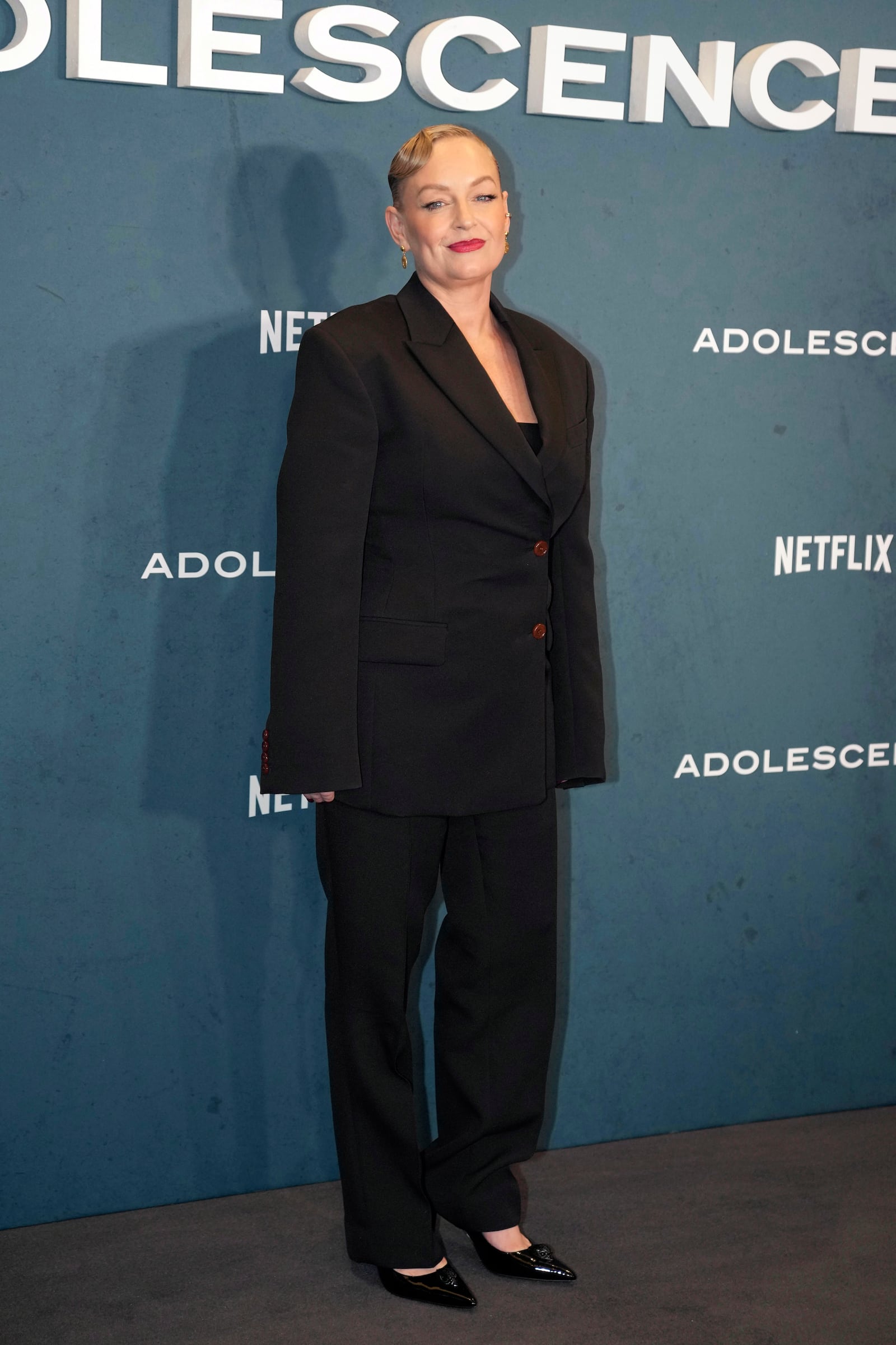 Christine Tremarco poses for photographers upon arrival at the special screening for "Adolescence" in London, Wednesday, March 12, 2025. (AP Photo/Kin Cheung)