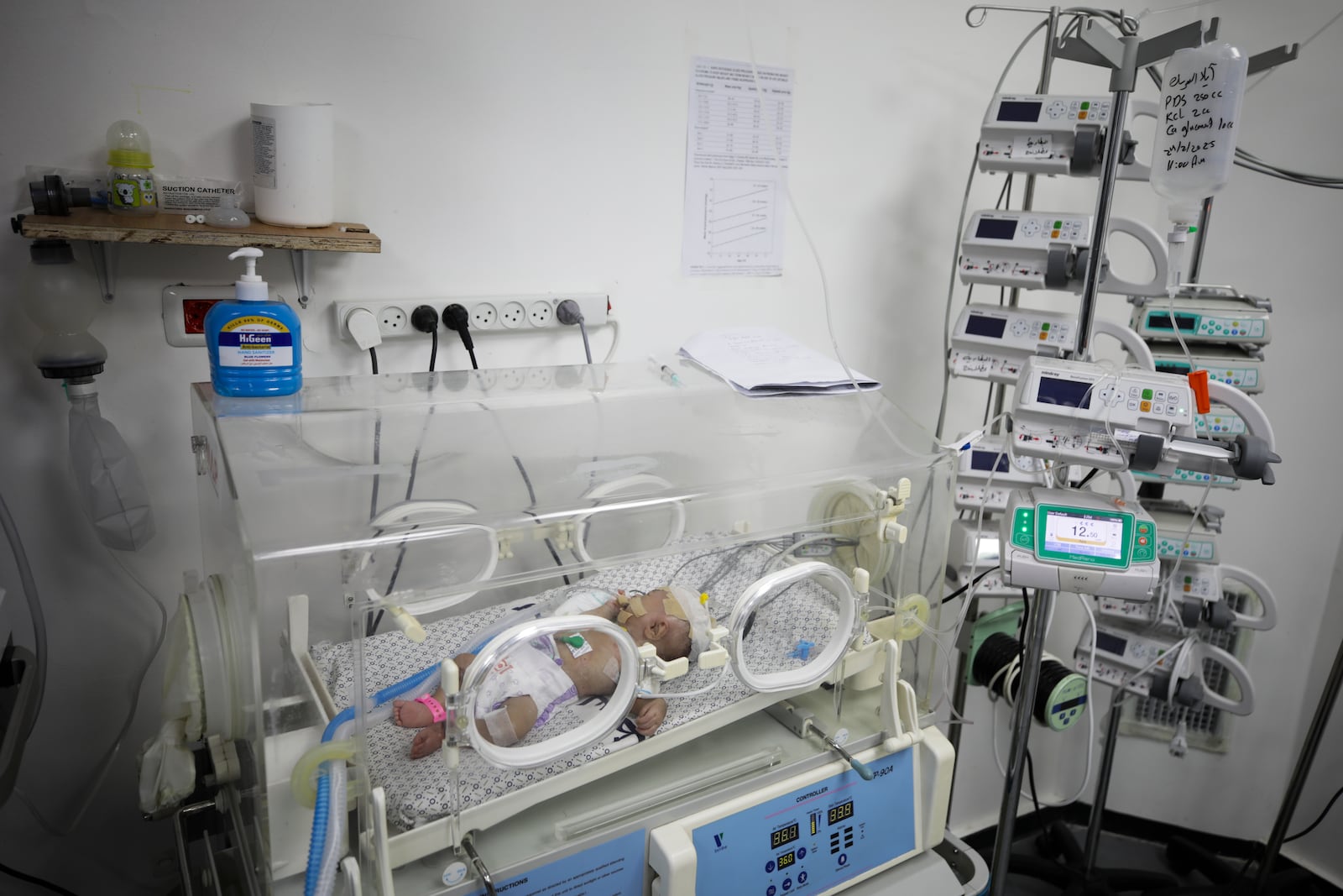 A two-month-old Palestinian baby, Eila Sarsak, receives treatment in an incubator at the Patient Friends Hospital in Gaza City, where she has been in intensive care for ten days due to the effects of the cold weather, on Tuesday, Feb. 25, 2025. (AP Photo/Jehad Alshrafi)