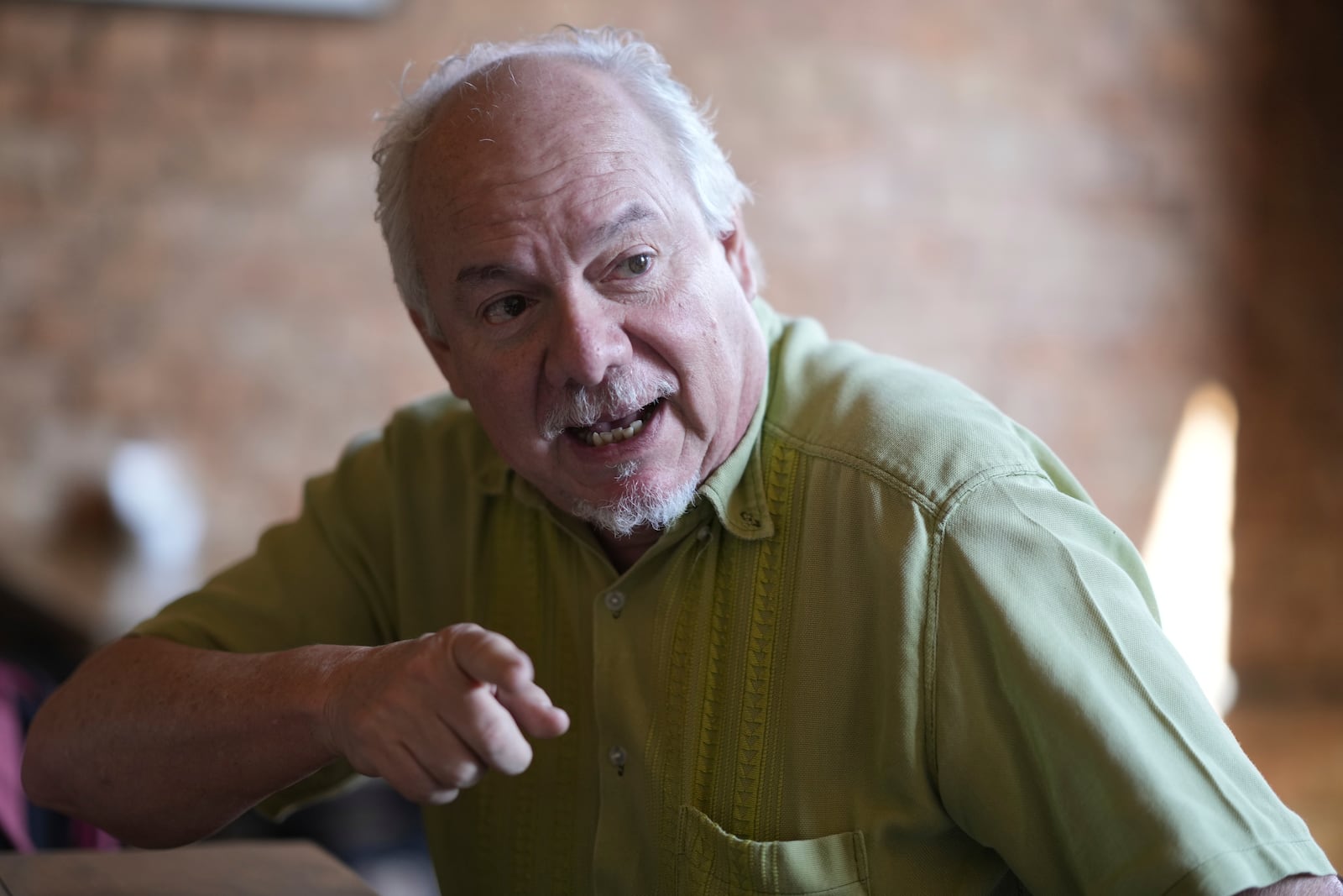 Rogelio Goiburu, the director of the National Memory Office, gives an interview in Asuncion, Paraguay, Tuesday, Oct. 29, 2024. Goiburu's father, an opponent of the Stroessner dictatorship, went missing in 1977. (AP Photo/Jorge Saenz)