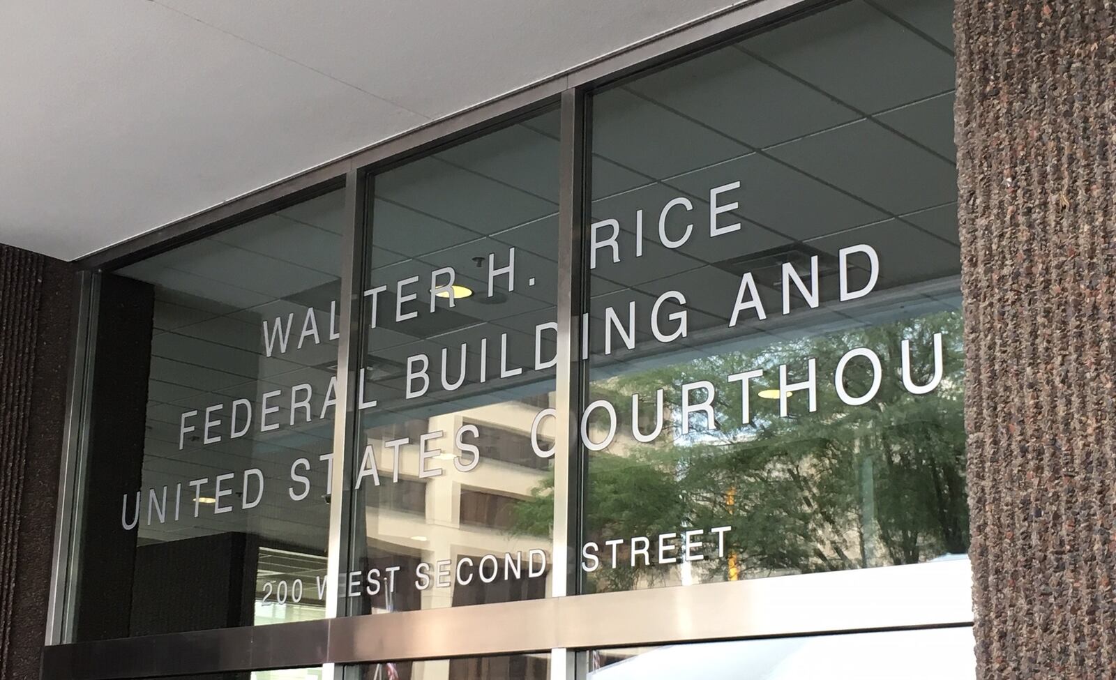 The front windows of the Walter H. Rice Federal Building and U.S. Courthouse in downtown Dayton. THOMAS GNAU / STAFF