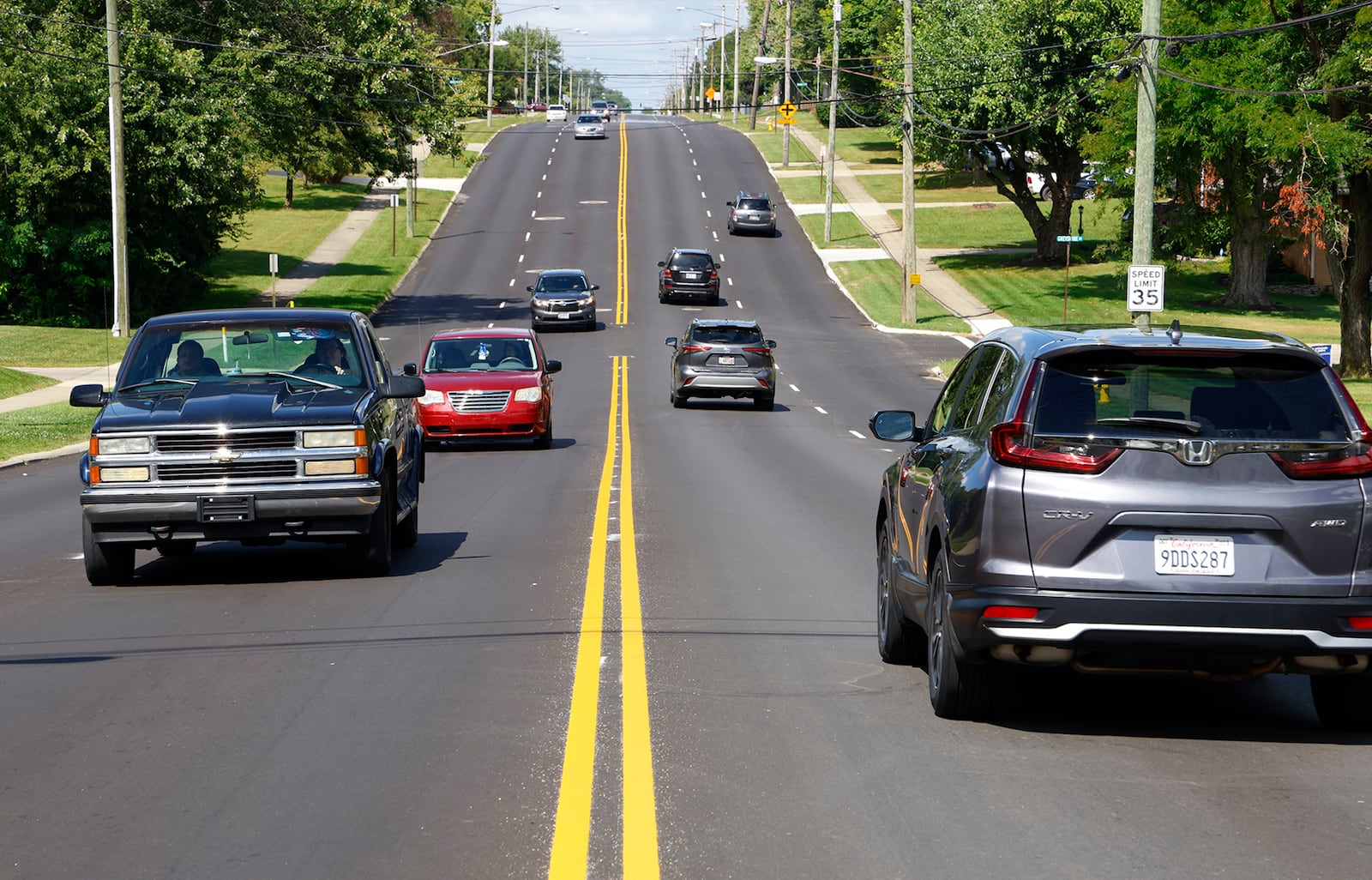 Traffic moves freely on Derr Road between Villa Road and Home Road Friday, Sept 8, 2023 as the orange cones have been removed marking the road project's completion. The City of Springfield has been working on the $1.4 million project since April. BILL LACKEY/STAFF BILL LACKEY/STAFF