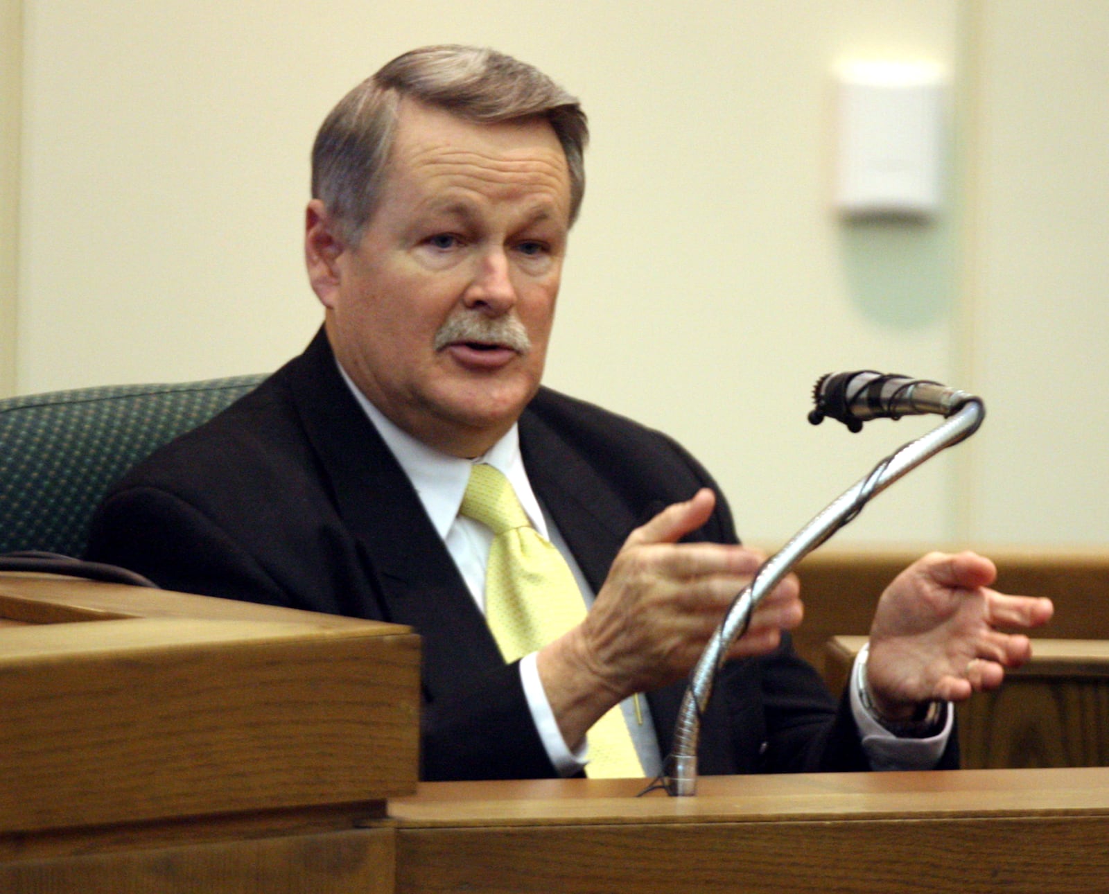 Doyle Burke, chief investigator for the Warren County Coroner's Office, testifies in Warren County Common Pleas Court Thursday, Jan. 27, 2011, about his experience at the Ryan Widmer home in August 2008. Staff photo by Greg Lynch