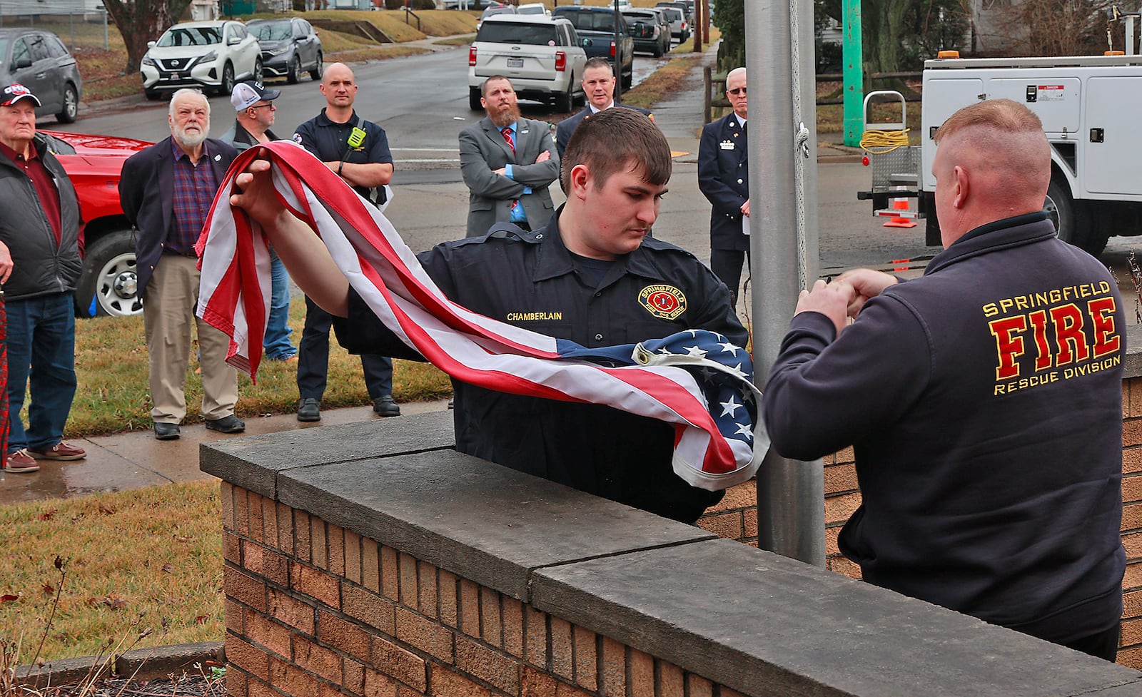 The ceremonial flag lowering concluded the decommissioning ceremony for Fire Station No. 3 on Selma Pike in the City of Springfield Tuesday, Jan. 3, 2023. A new fire station is being constructed on South Limestone Street to replace the existing station. BILL LACKEY/STAFF