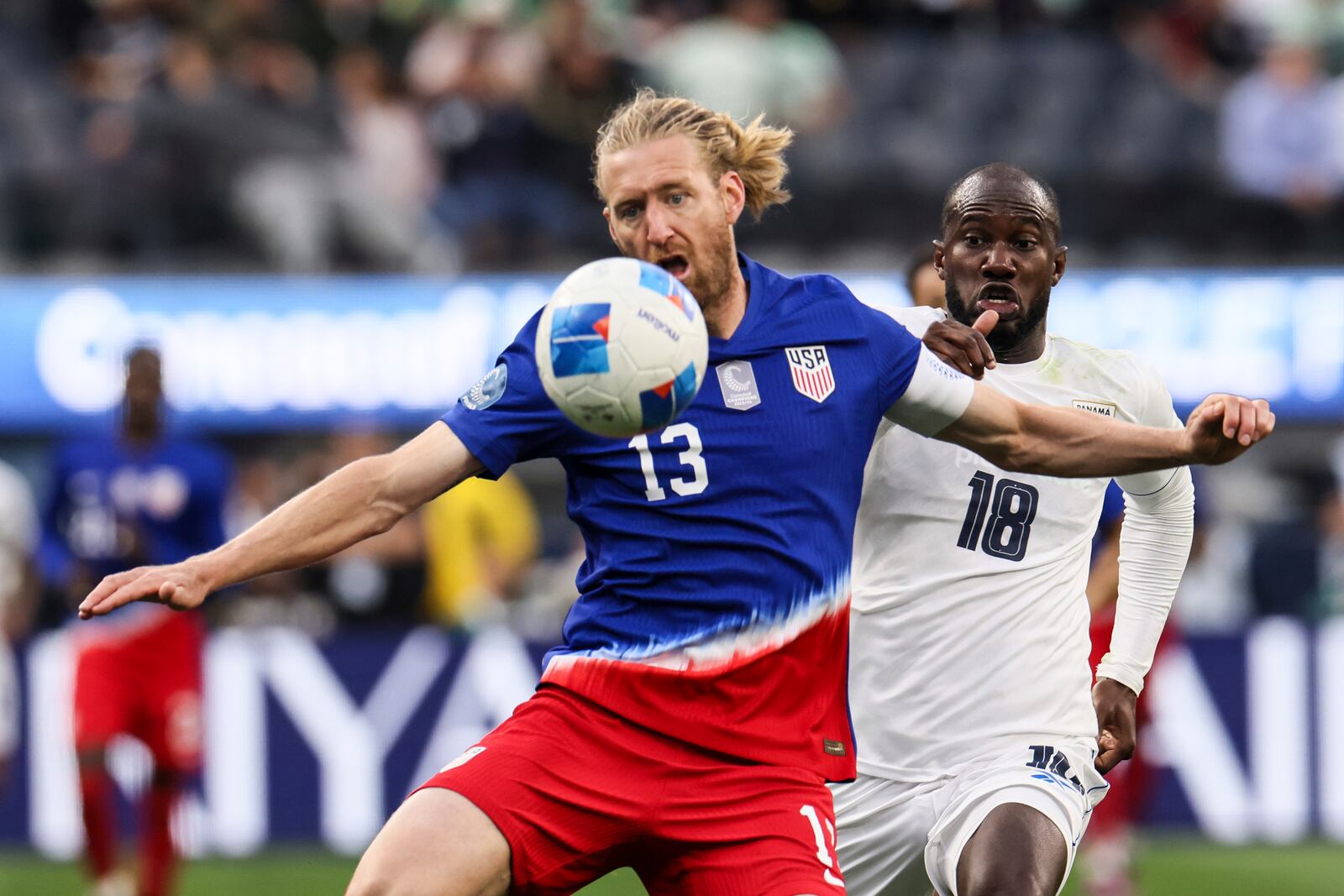 United States' Timothy Ream, left, controls the ball away from Panama's Cecilio Waterman Ruiz during the second half of a CONCACAF Nations League semifinal soccer match Thursday, March 20, 2025, in Inglewood, Calif. (AP Photo/Etienne Laurent)