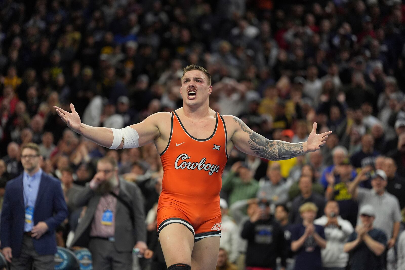 Oklahoma State's Wyatt Hendrickson reacts after defeating Minnesota's Gable Steveson during a 285-pound match in the finals at the NCAA wrestling championship, Saturday, March 22, 2025, in Philadelphia. (AP Photo/Matt Rourke)