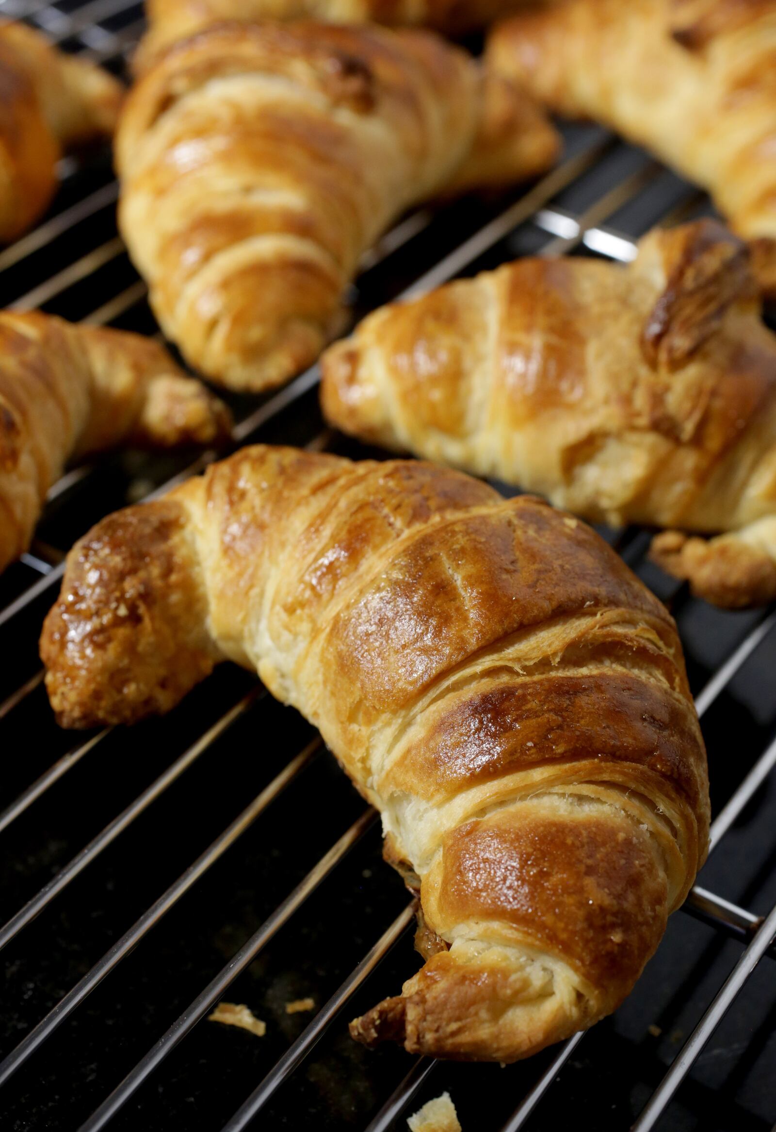 Baked croissants cooling on a wire rack, Wednesday, Oct. 20, 2021. (Hillary Levin/St. Louis Post-Dispatch/TNS)