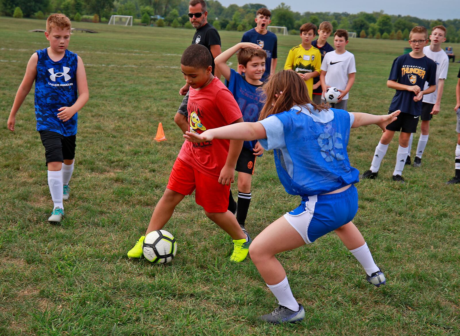 Dream Soccer players in the middle age group practice Thursday, August 15, 2024 at National Trail Soccer Complex for the 18th Annual Tournament on Friday. BILL LACKEY/STAFF