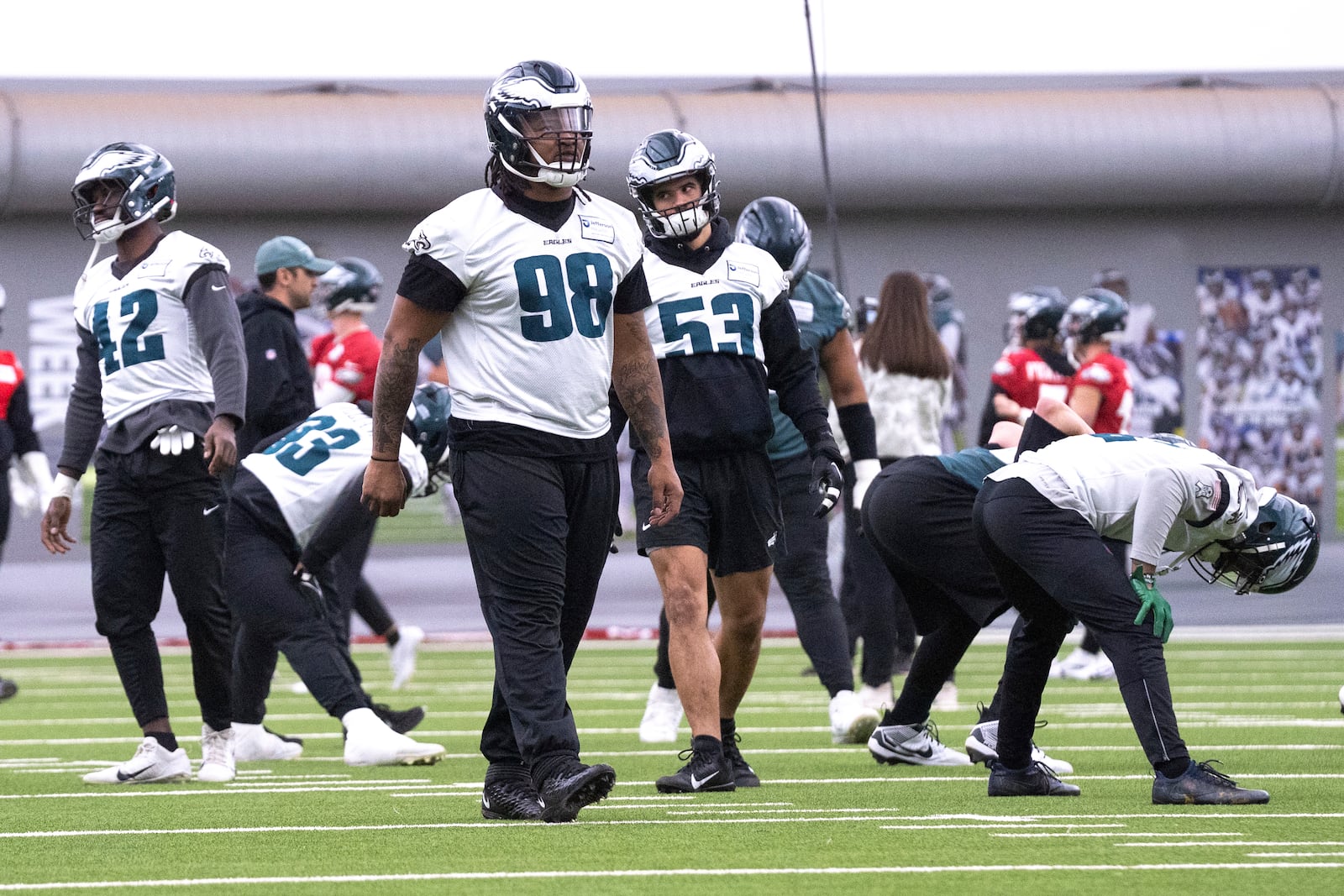 Philadelphia Eagles defensive tackle Jalen Carter (98) warms up during practice at the NFL football team's training facility, Friday, Jan. 24, 2025, in Philadelphia. (AP Photo/Chris Szagola)