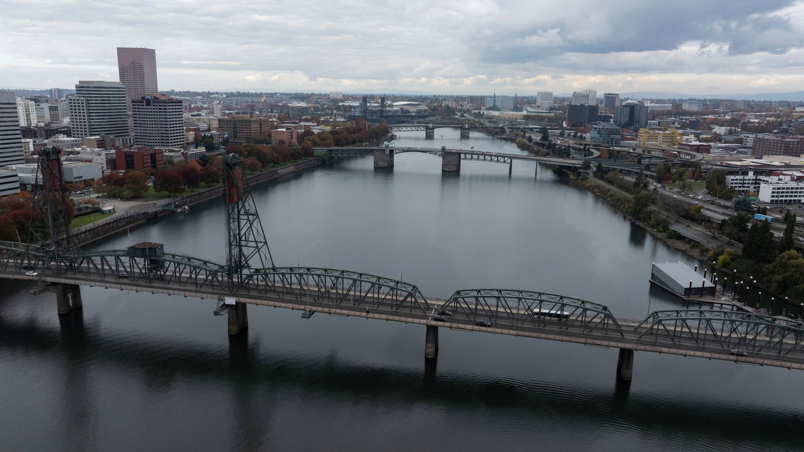 FILE - Vehicles cross the Hawthorne Bridge over the Willamette River on Tuesday, Oct. 29, 2024, in Portland, Ore. (AP Photo/Jenny Kane, File)