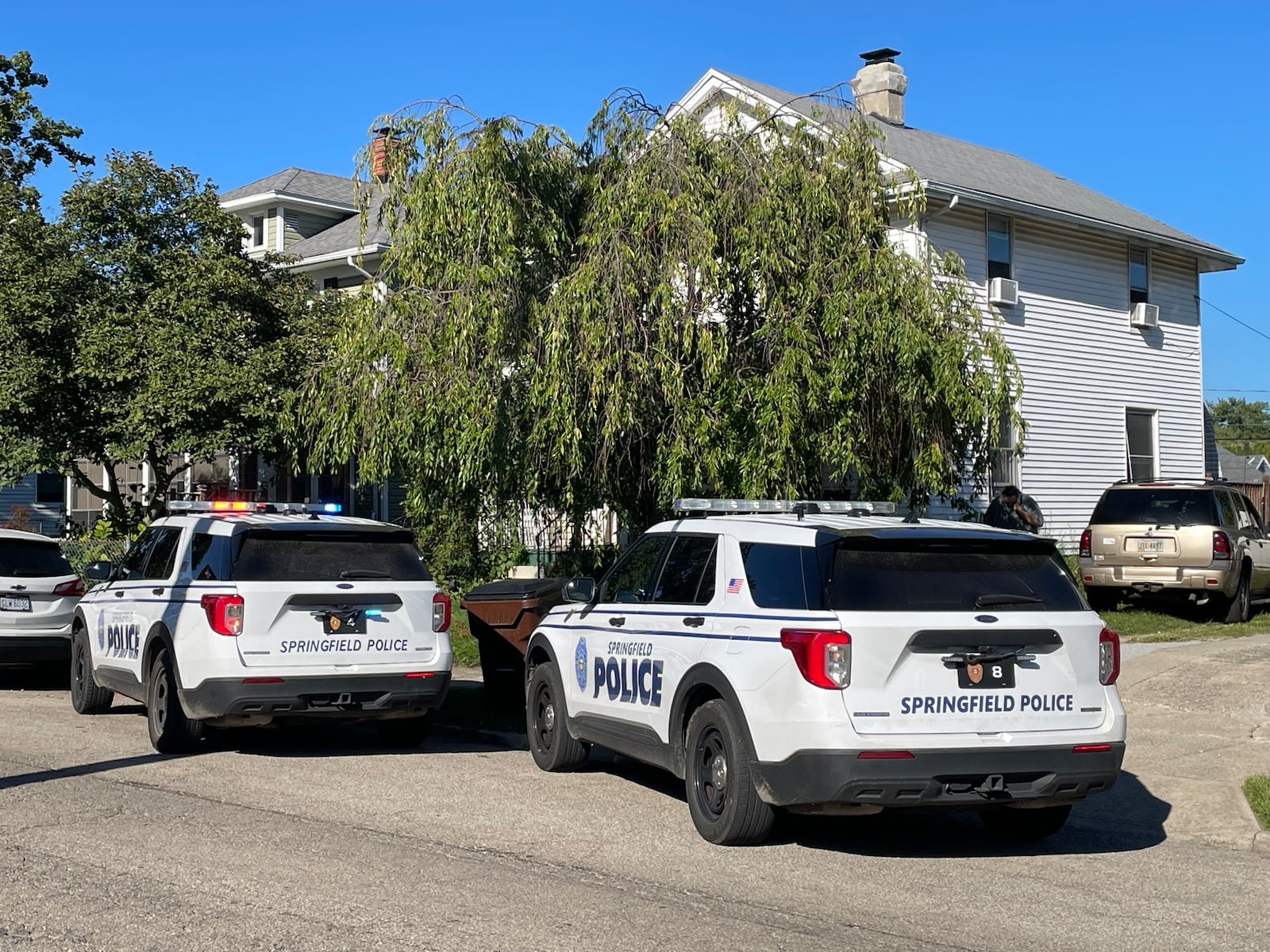 Springfield police and fire personnel were on the scene at a house in the 200 block of North Clairmont Avenue where a 2-year-old boy was found in a backyard pool Thursday, Aug. 31, 2023. BILL LACKEY/STAFF