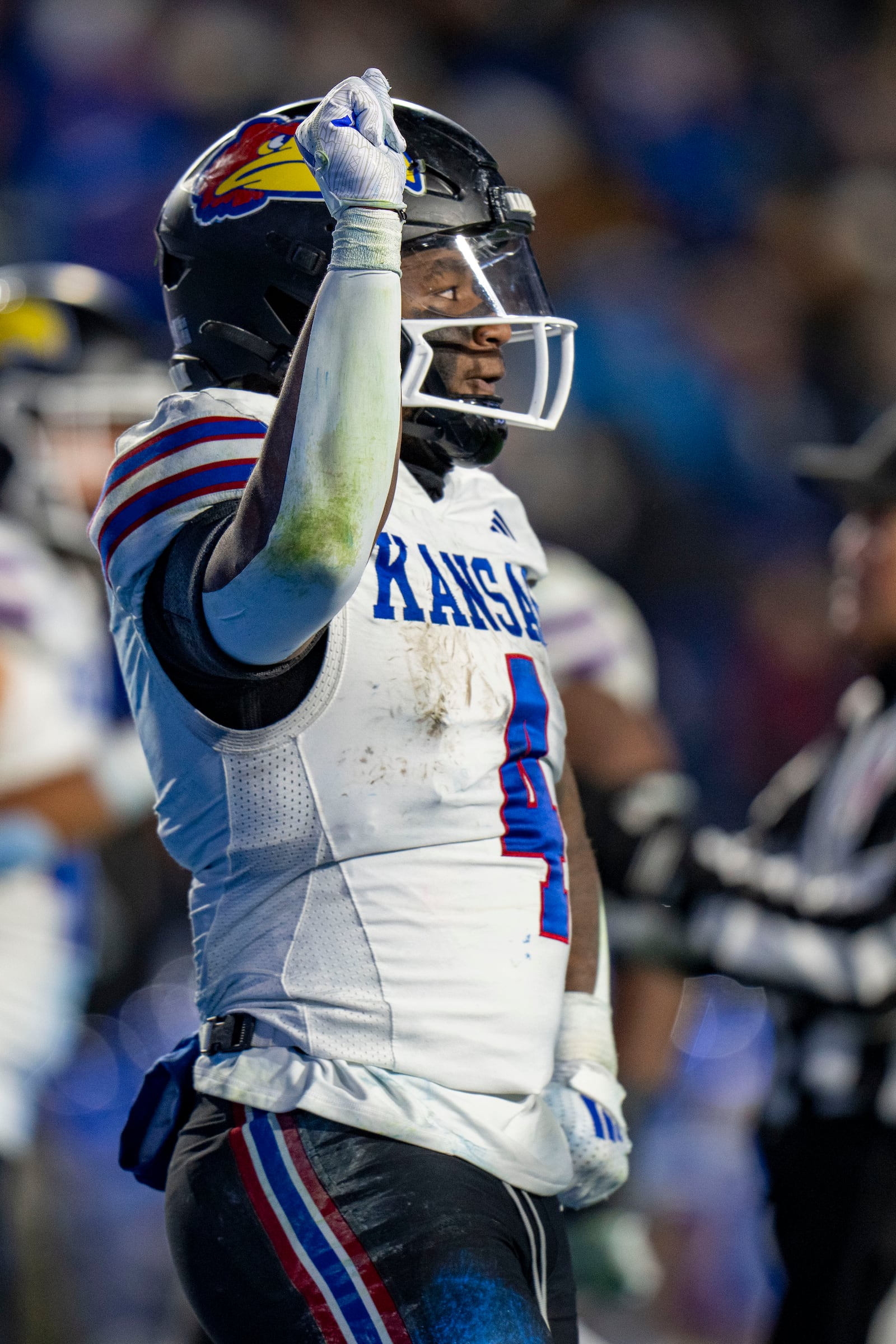 Kansas running back Devin Neal celebrates after scoring a touchdown in the second half of an NCAA college football game Saturday, Nov. 16, 2024, in Provo. (AP Photo/Rick Egan)