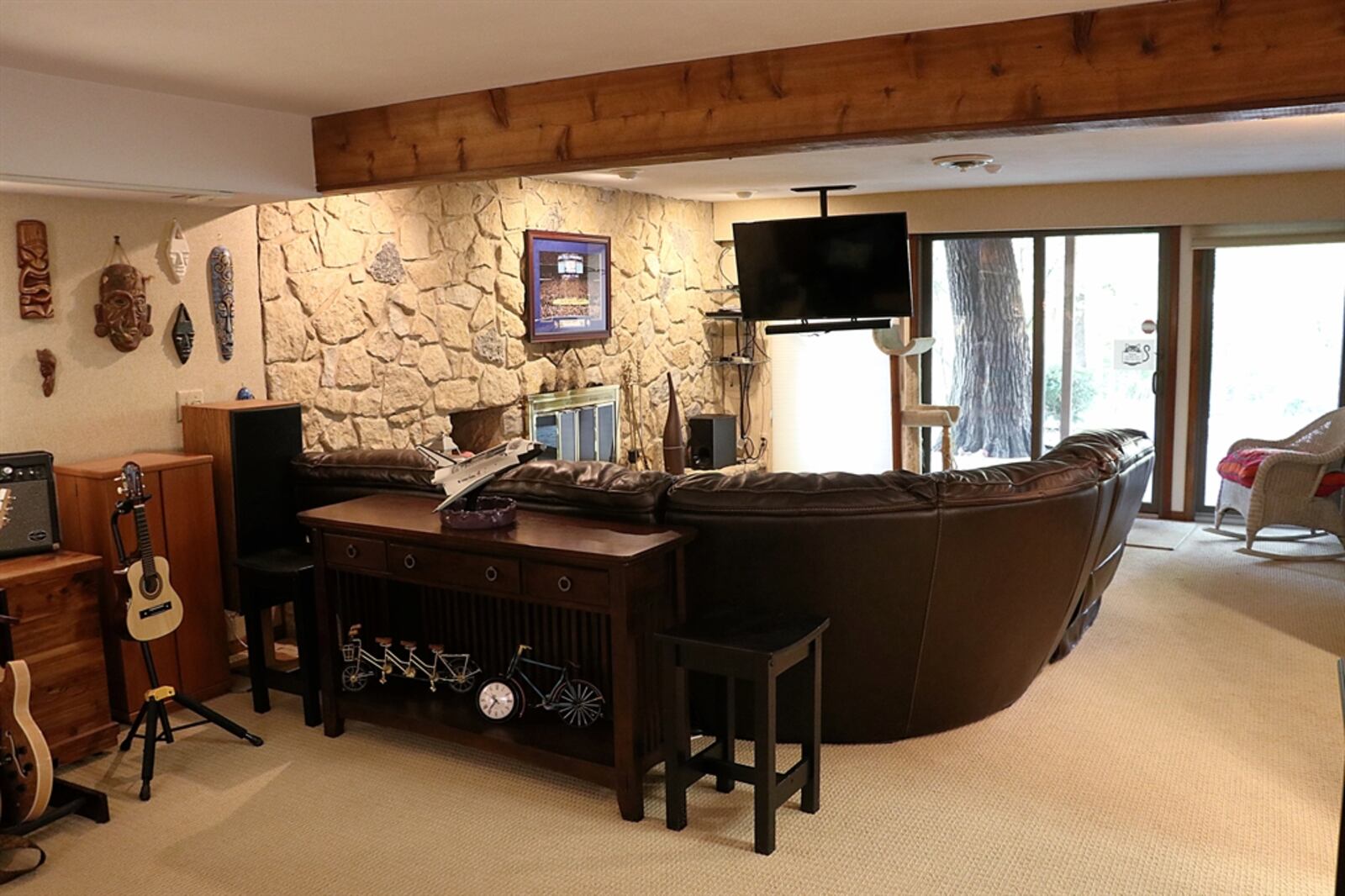 A recreation room features a stone fireplace. Contributed photo by Kathy Tyler

