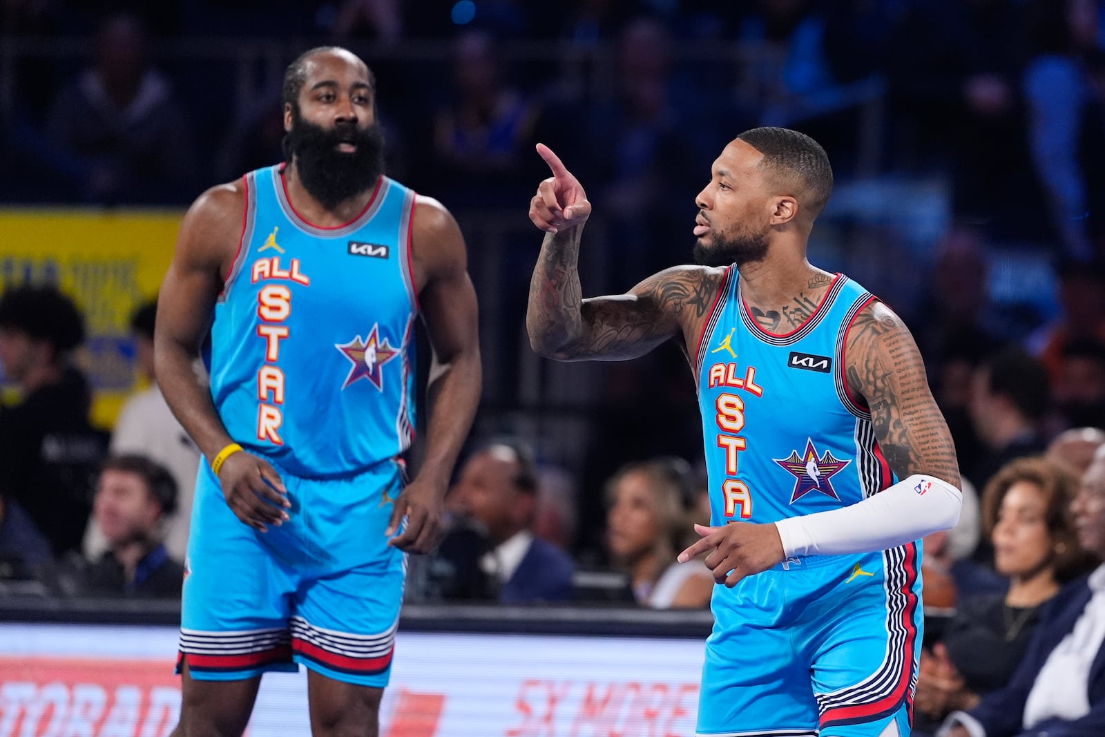 Milwaukee Bucks guard Damian Lillard, right, gestures next to Los Angeles Clipper guard James Harden during the NBA All-Star basketball game Sunday, Feb. 16, 2025, in San Francisco. (AP Photo/Godofredo A. Vásquez)