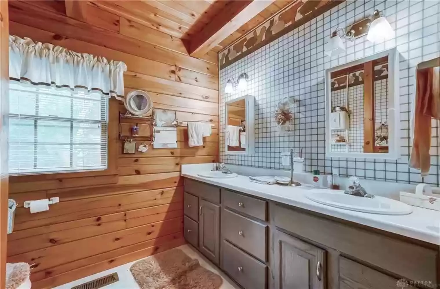 PHOTOS: Custom log-cabin style home listed near New Carlisle