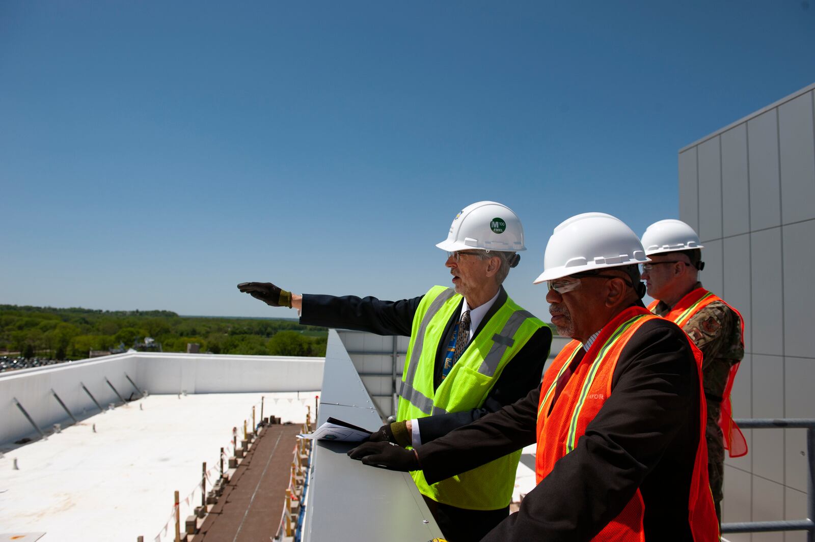 David Bek, National Air and Space Intelligence Center (NASIC) Facilities and Logistics division chief, showcases the layout of the new Intelligence Production Center III to Dayton Mayor Jeffrey Mims Jr. during his visit to Wright-Patterson Air Force Base May 9.  Expected to be completed in 2024, IPC III will add 980 workstations, mission-specific functions, and advanced visualization capabilities to the NASIC campus. Air Force photo by Kristof J. Rixmann.