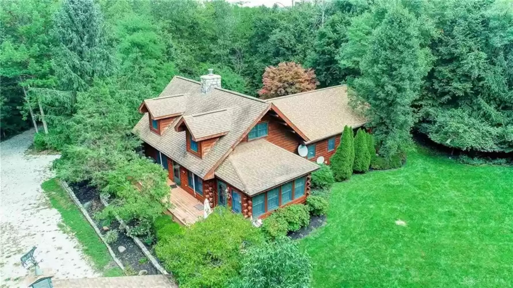 PHOTOS: Custom log-cabin style home listed near New Carlisle