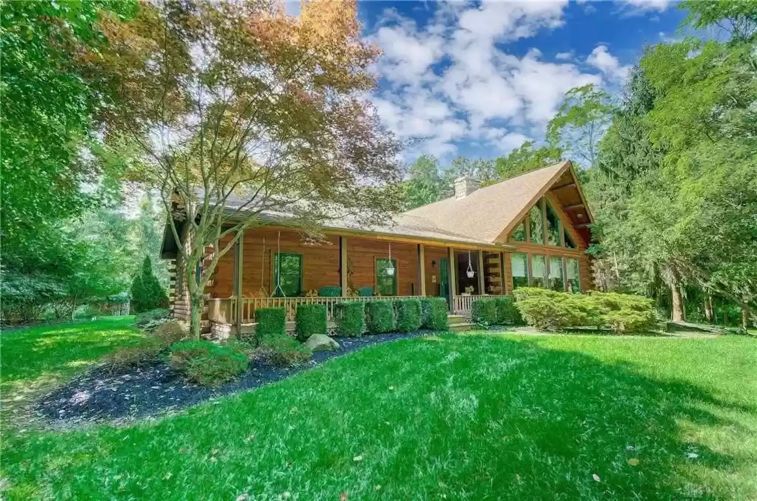 PHOTOS: Custom log-cabin style home listed near New Carlisle