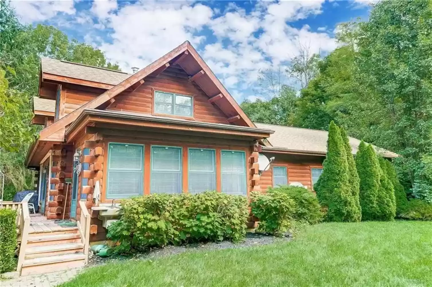 PHOTOS: Custom log-cabin style home listed near New Carlisle