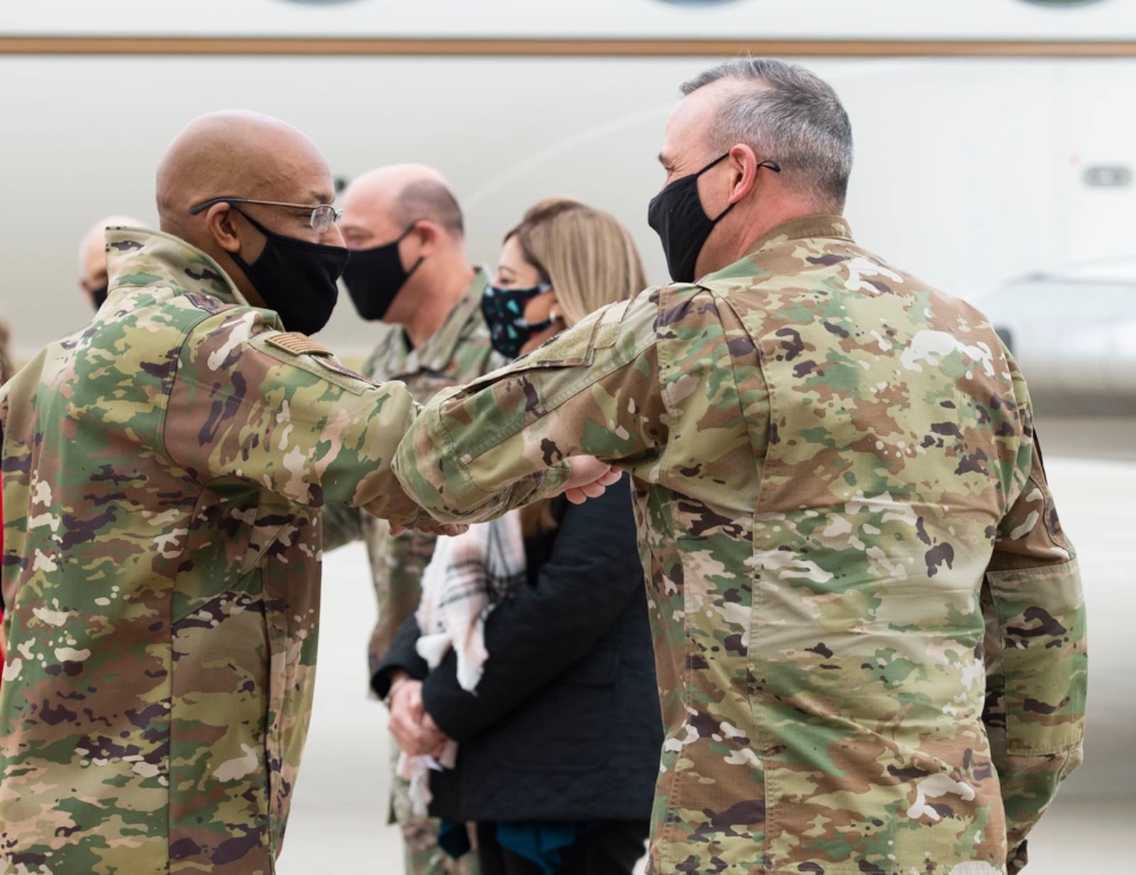 Col. Maurizio Calabrese, National Air and Space Intelligence Center commander, greets U.S. Air Force Chief of Staff Gen. Charles Q. Brown Jr. upon his arrival to Wright-Patterson Air Force Base, Dec. 3, 2020. (U.S. Air Force photo by Wesley Farnsworth)