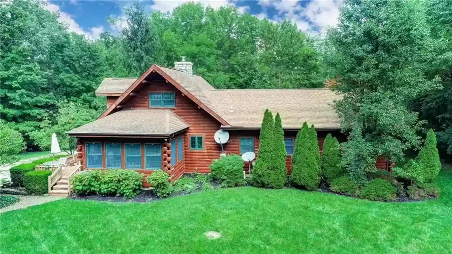 PHOTOS: Custom log-cabin style home listed near New Carlisle